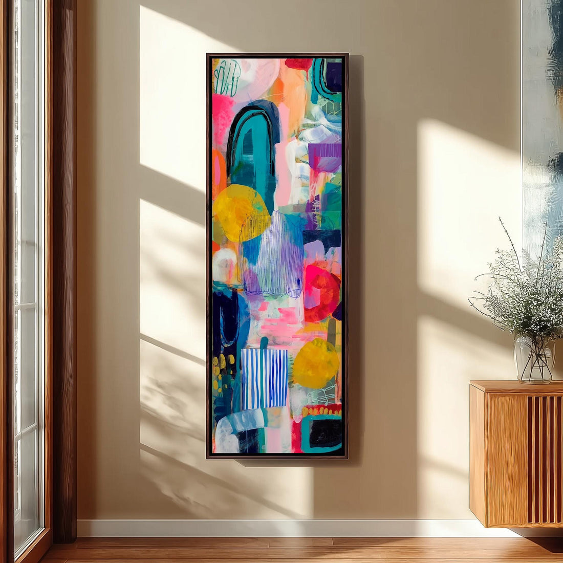 a large, colorful abstract painting hanging on a wall in a room with wooden furniture.
