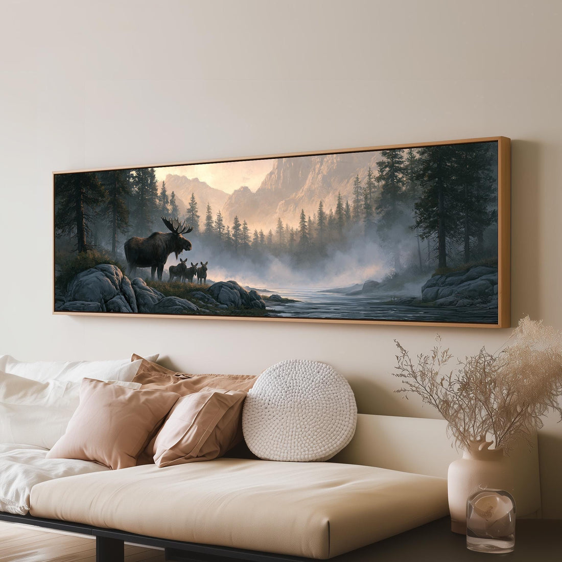 Moose and calf in a misty mountain valley long horizontal canvas print above a sofa in a living room