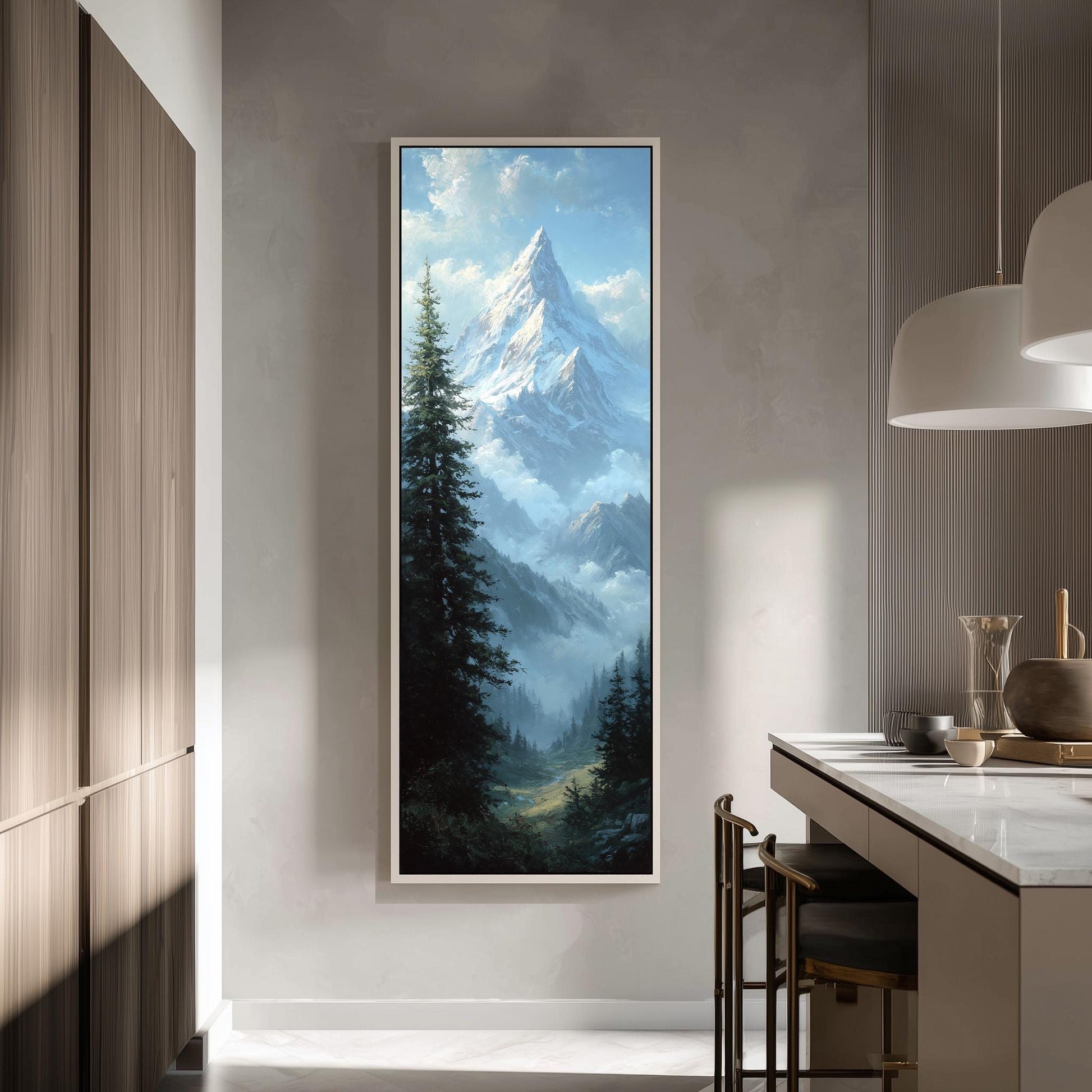 a large framed painting of a mountain landscape hanging on a wall in a modern kitchen.
