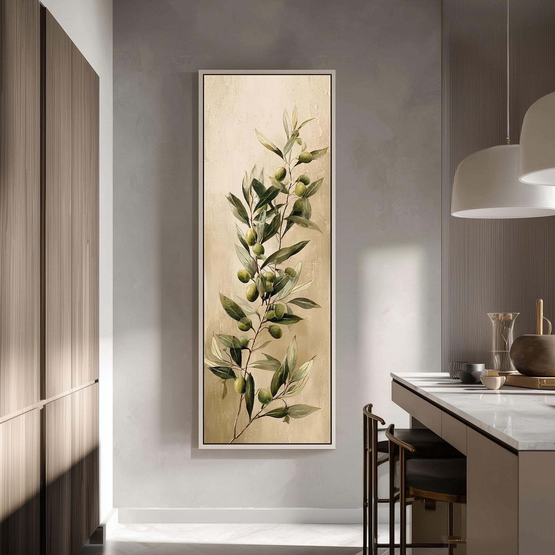 a large framed painting of a branch with green leaves and small green fruits hanging on a wall in a modern kitchen.