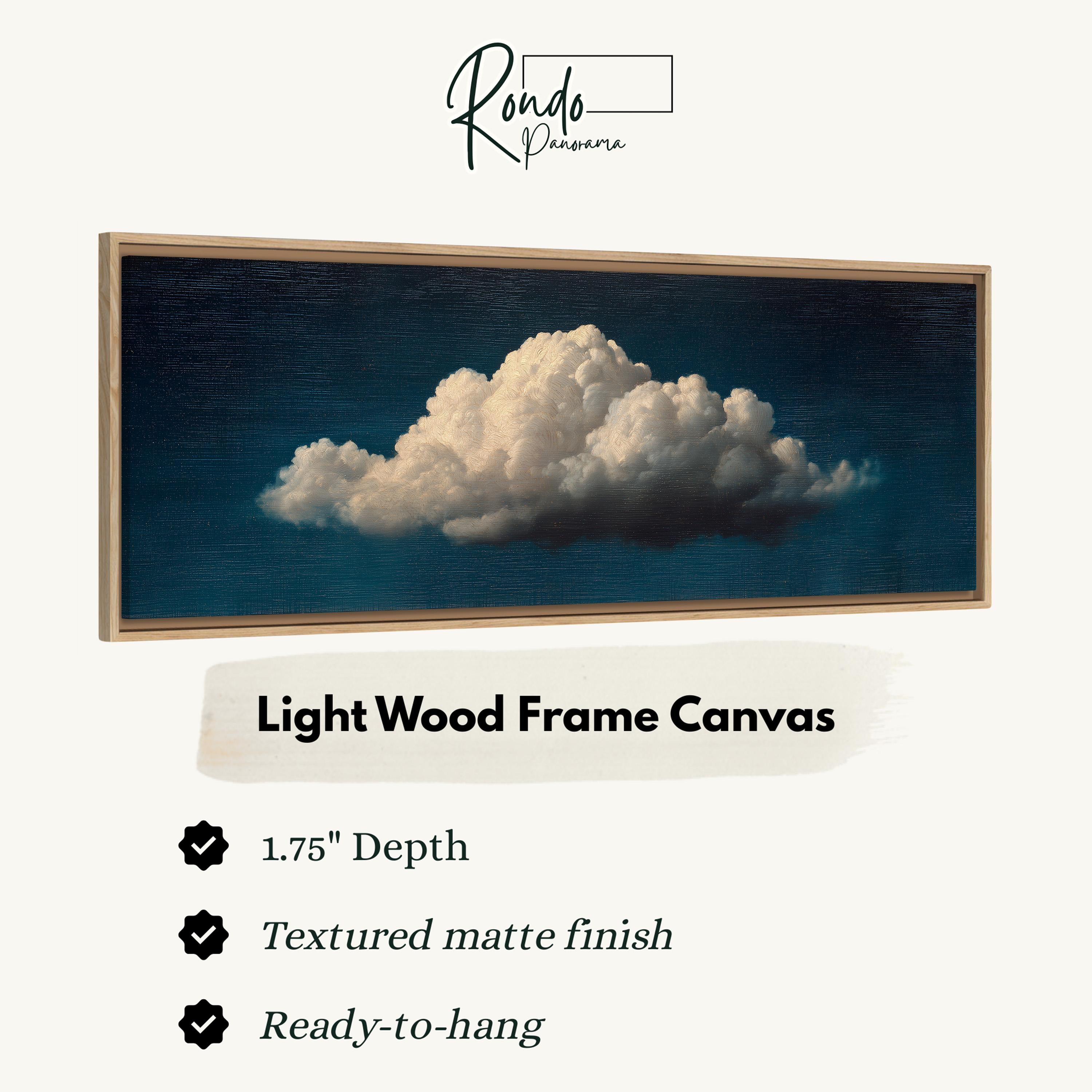 The image is a framed artwork depicting a large, fluffy cloud against a dark blue sky.
