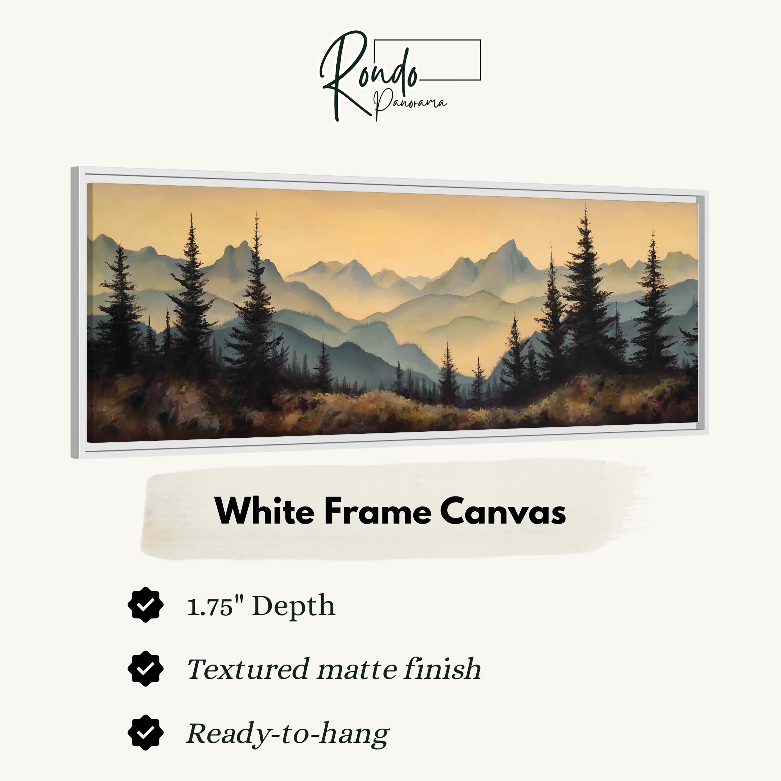 The image is a white frame canvas depicting a scenic mountain landscape with pine trees and a hazy, golden sky.