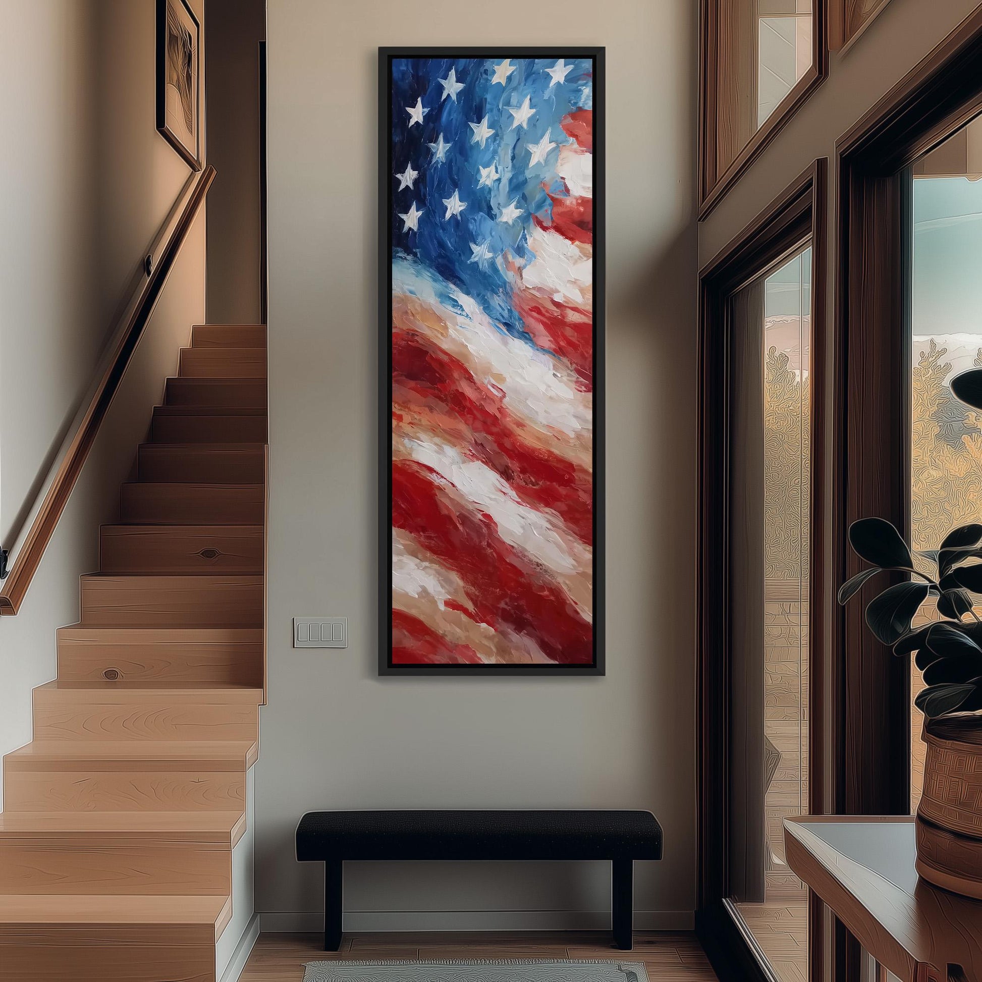 a large American flag painting hanging on the wall of a hallway. The painting is framed and appears to be a vibrant representation of the flag. The hallway has a wooden staircase and a bench, creating a cozy and welcoming atmosphere.