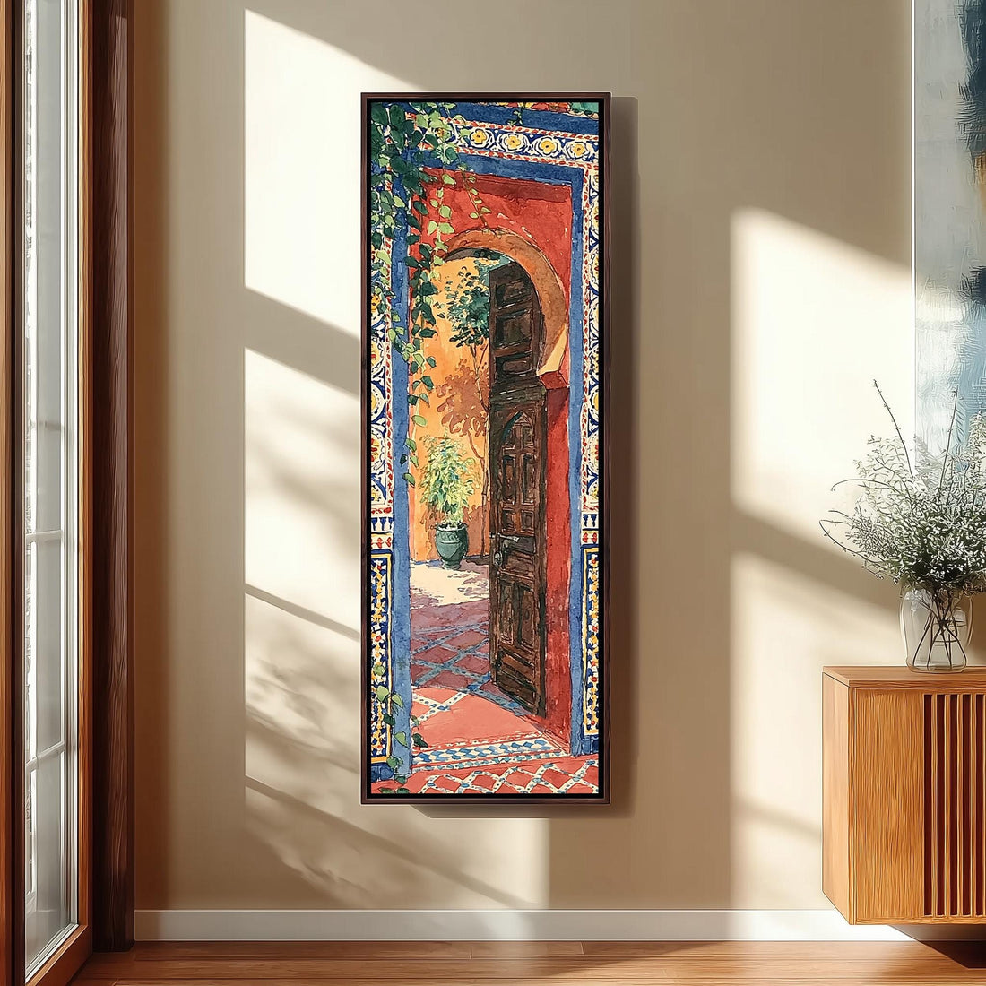 Moroccan courtyard through a carved door long vertical canvas print in a sunlit living space