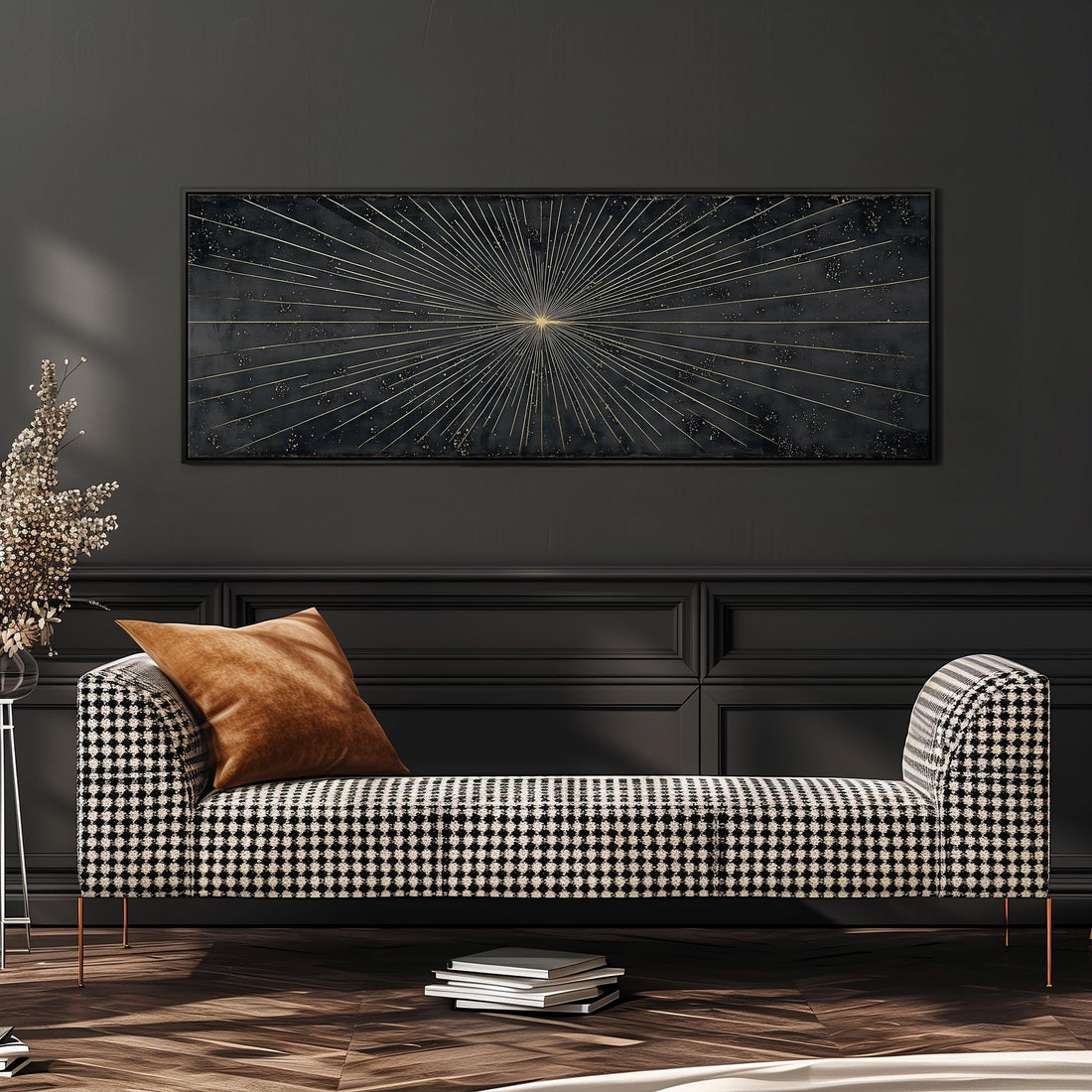 a modern living room with a black and white checkered sofa, a large abstract painting on the wall, and a stack of books on the floor.