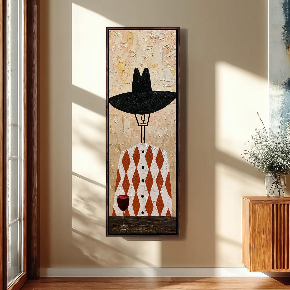 Folk figure in a black hat with red wine long vertical canvas print in a sunlit living space