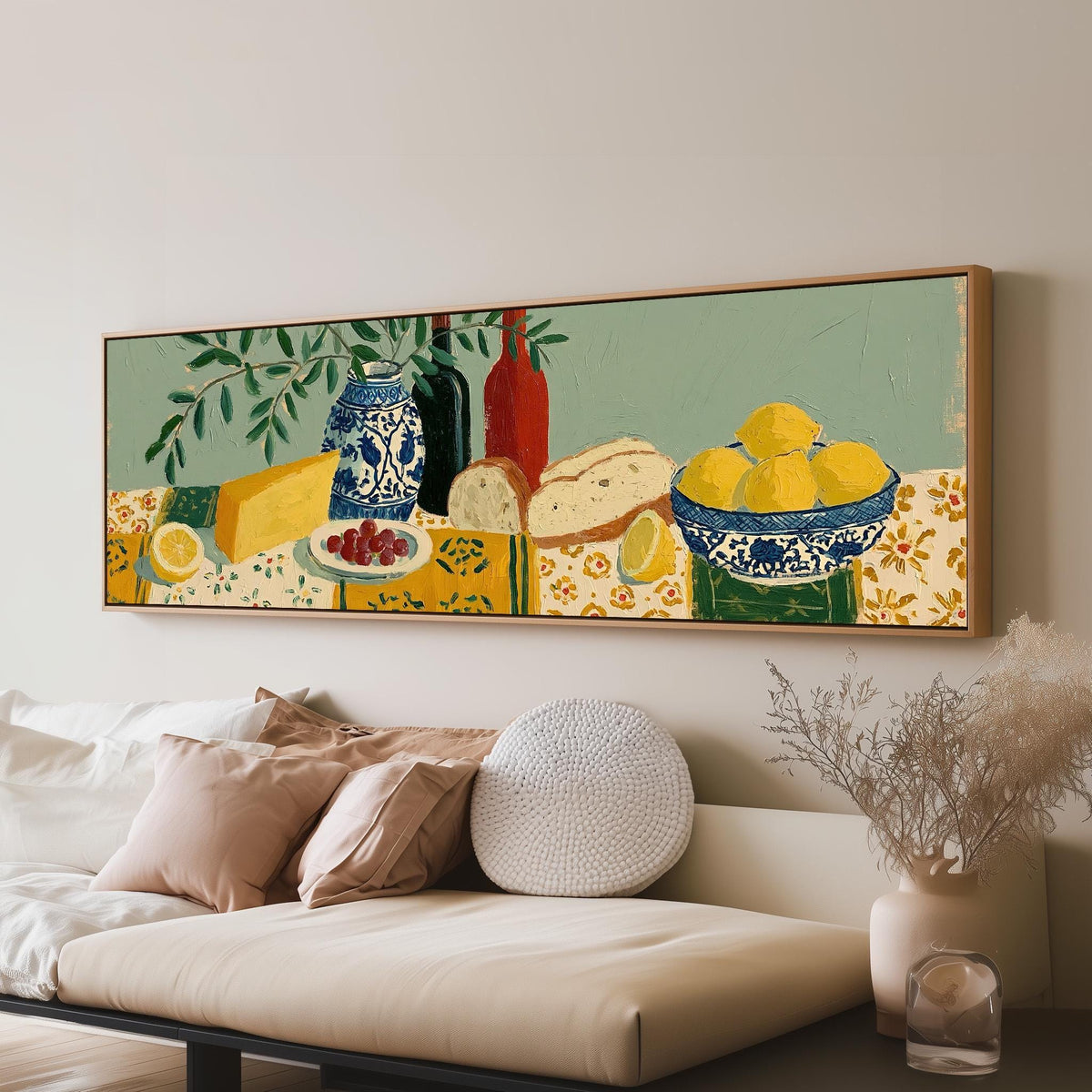 Cheese, wine and lemon spread panoramic canvas print above a sofa in a living room