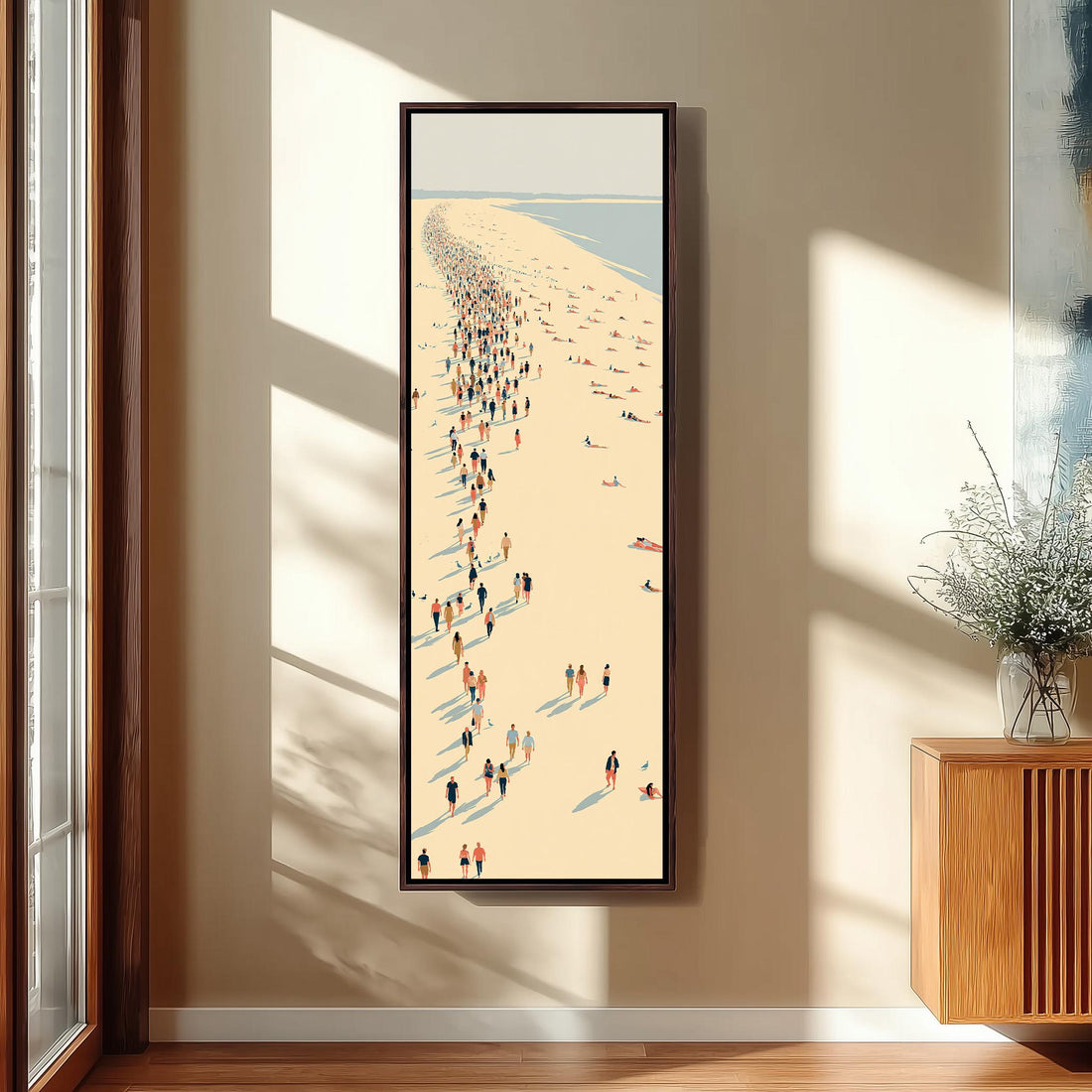 Crowds along a curving beach shoreline from above long vertical canvas print in a sunlit living space