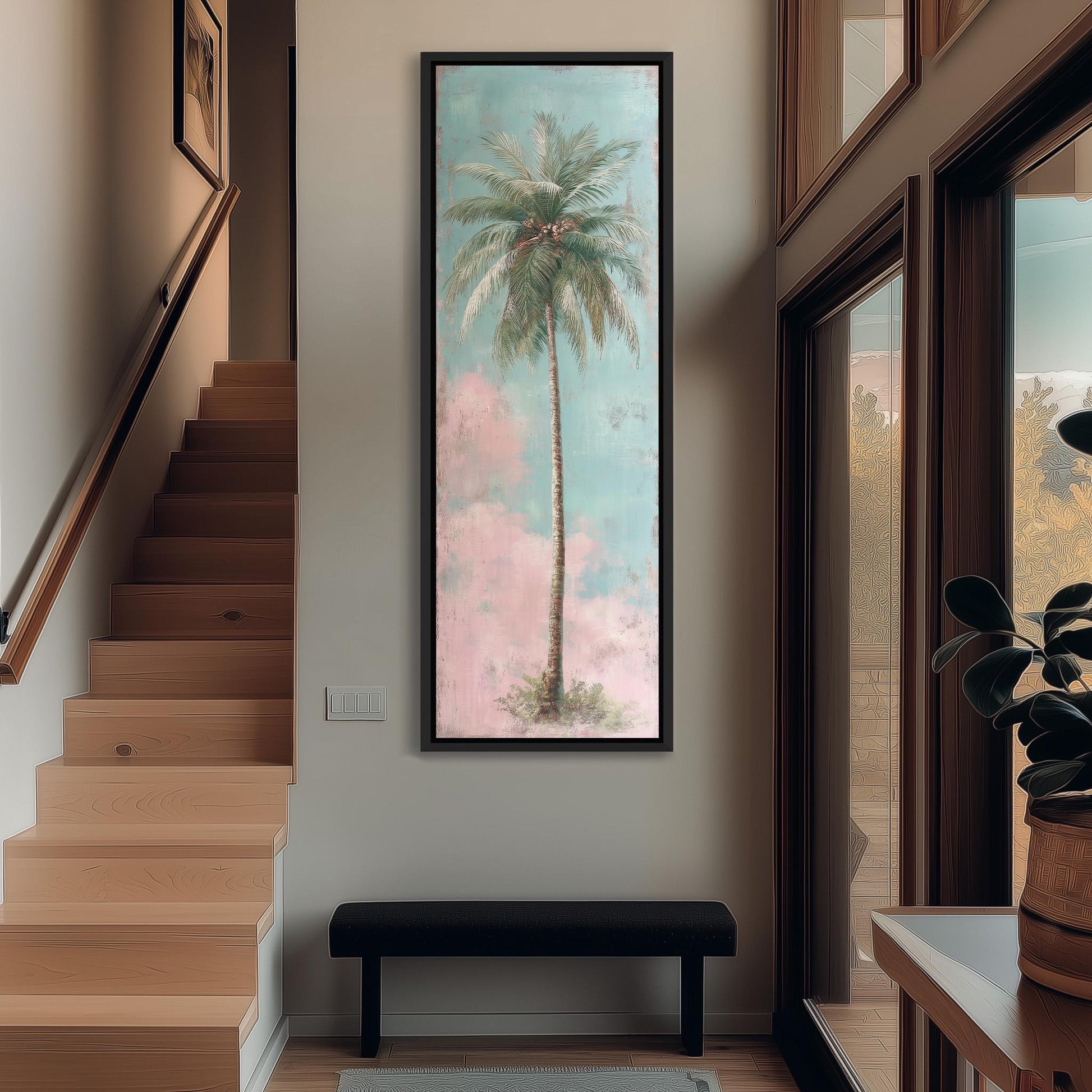 a large painting of a palm tree hanging on the wall of a room with wooden stairs and a bench.