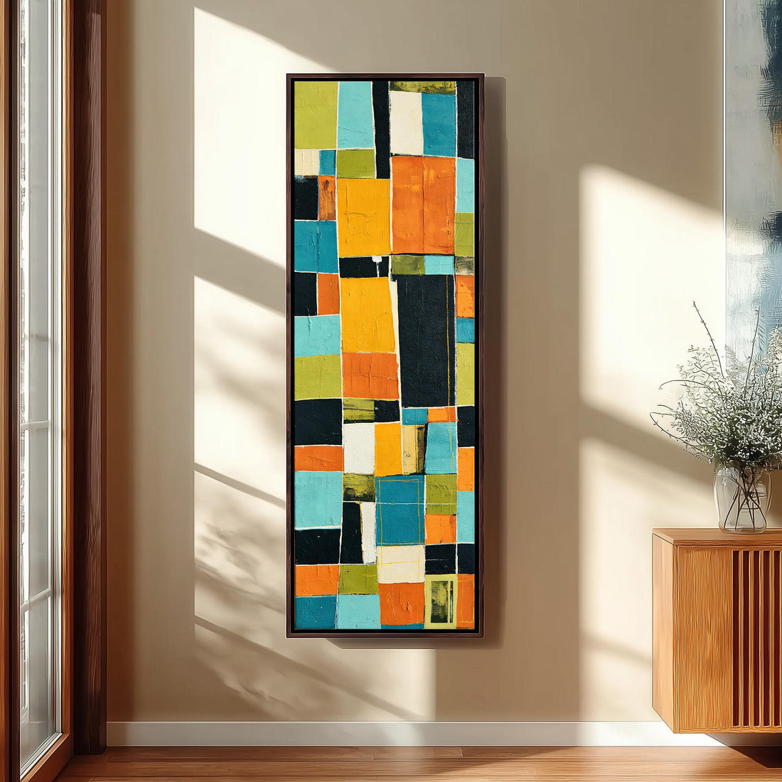Bold mustard and teal patchwork blocks long vertical canvas print in a sunlit living space
