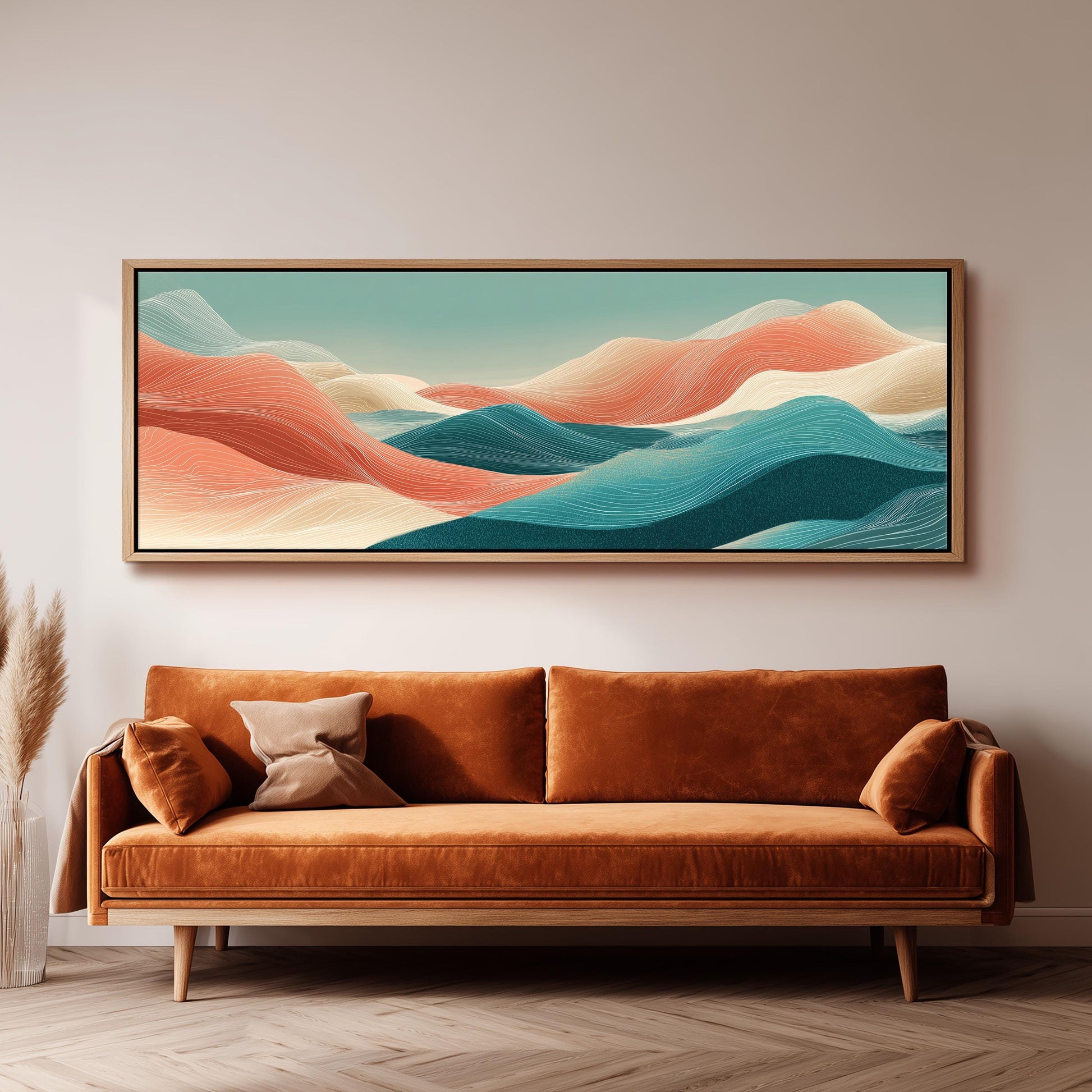 a large, abstract landscape painting hanging on a wall above a brown sofa with a wooden frame.