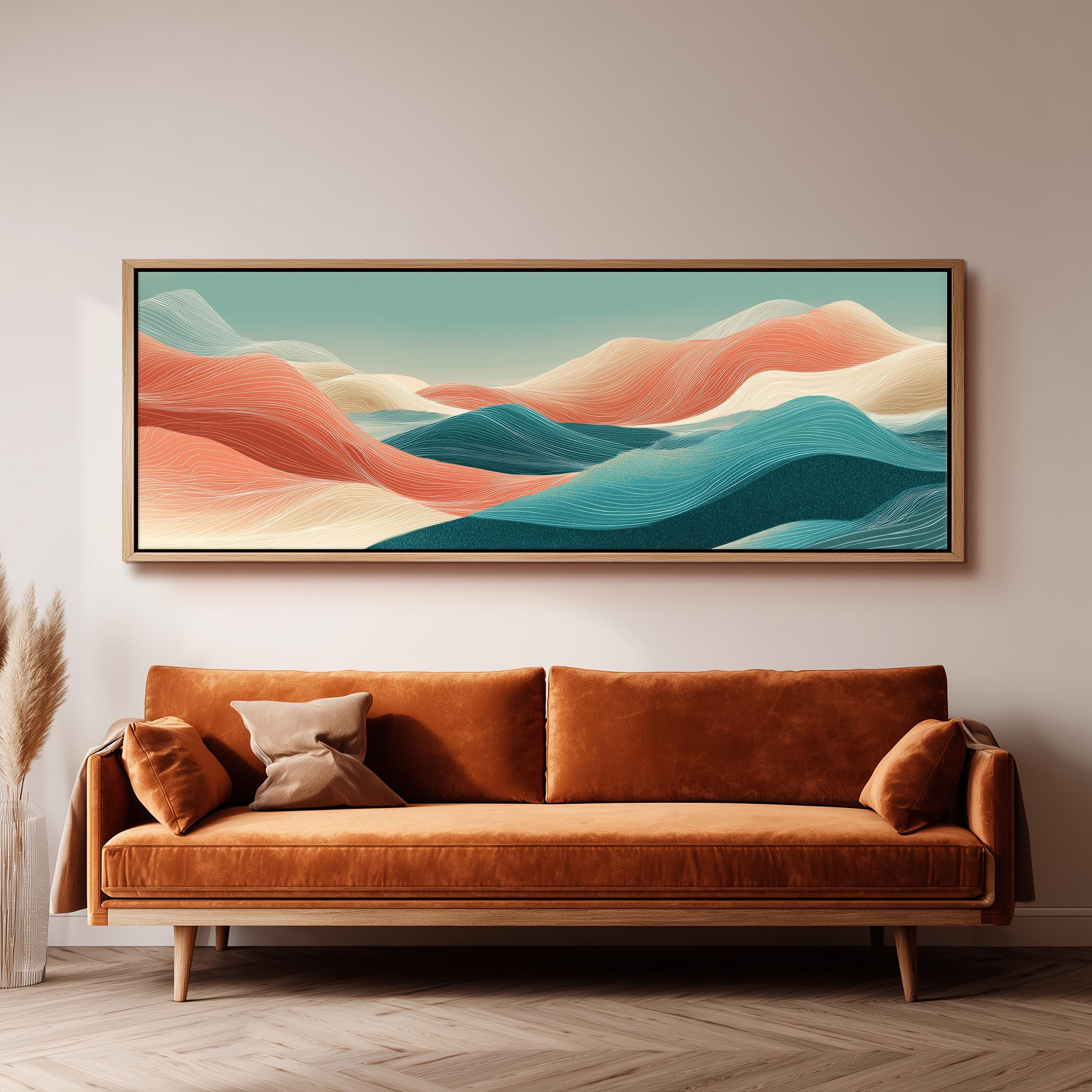 a large, abstract landscape painting hanging on a wall above a brown sofa with a wooden frame.