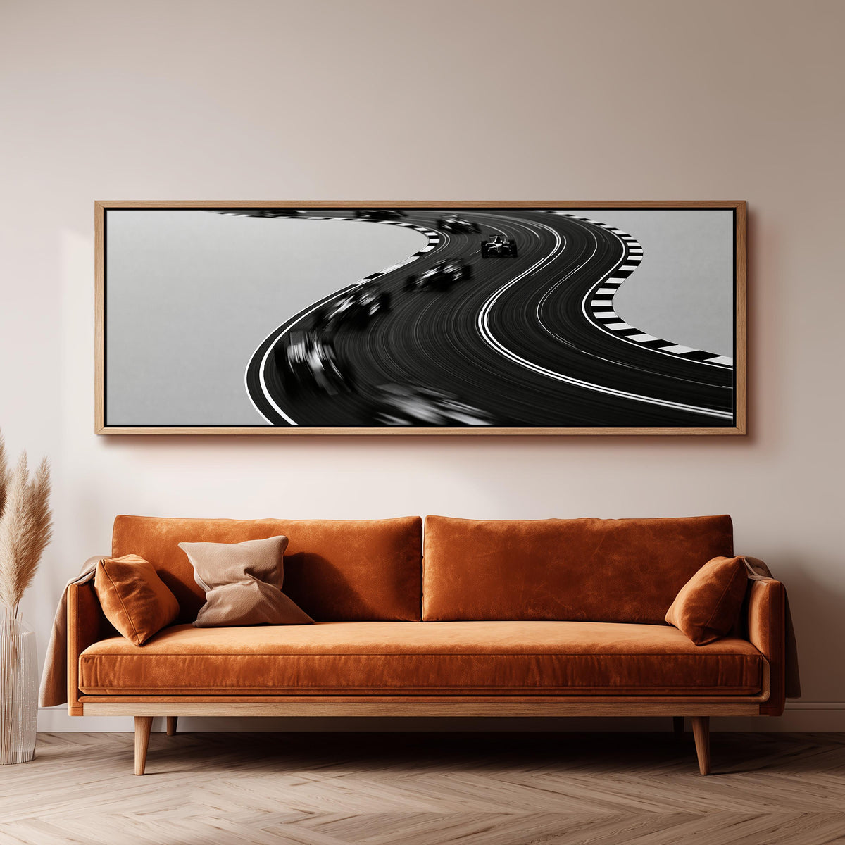 Winding race track in monochrome wide panoramic canvas print above a bench in a dark living room