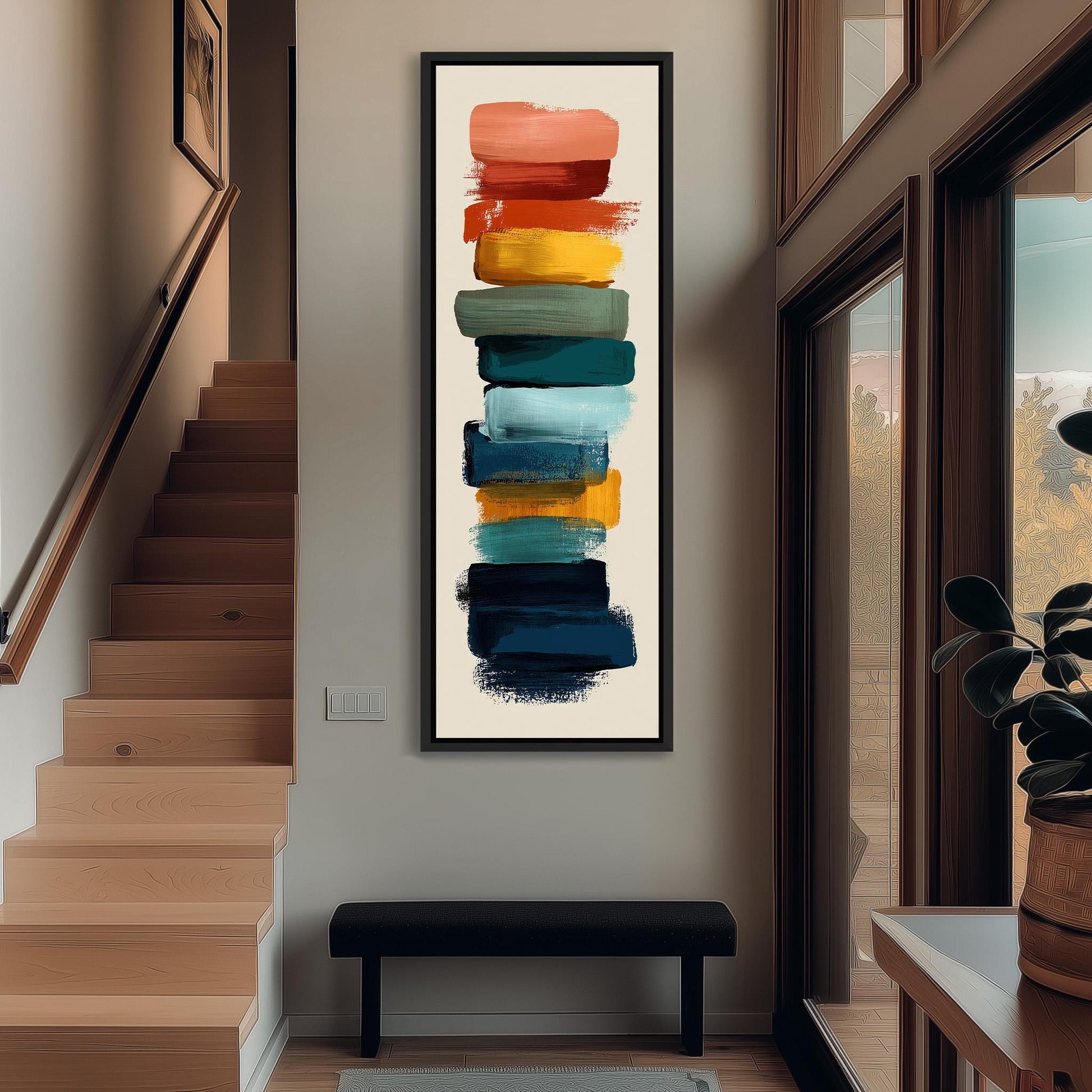 a modern art piece with a vertical arrangement of colorful brushstrokes on a white background, hanging on the wall of a hallway.