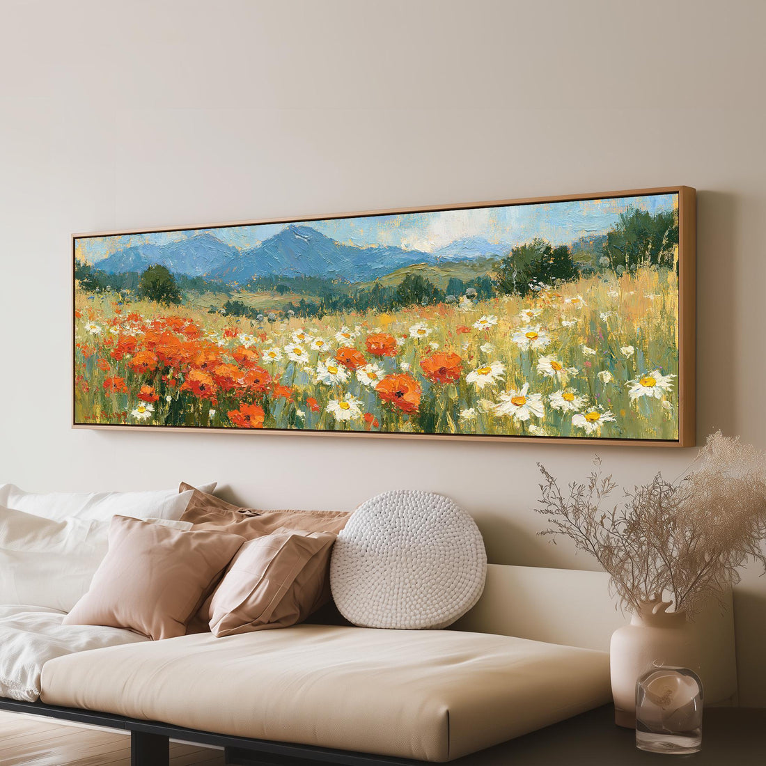 Alpine poppy and daisy meadow long horizontal canvas print above a sofa in a living room