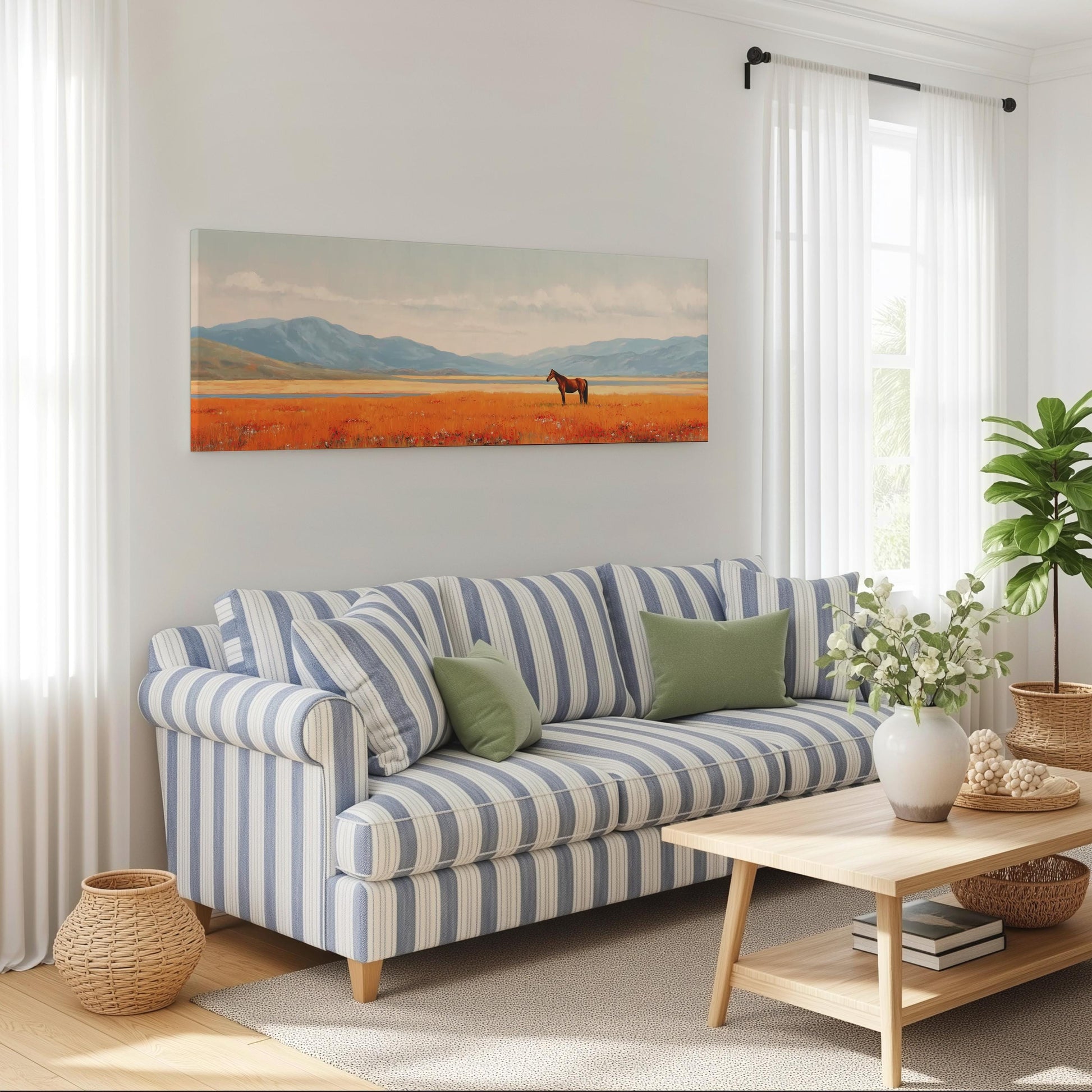 a cozy living room with a striped blue and white sofa, a wooden coffee table, and a painting of a horse in a field on the wall.