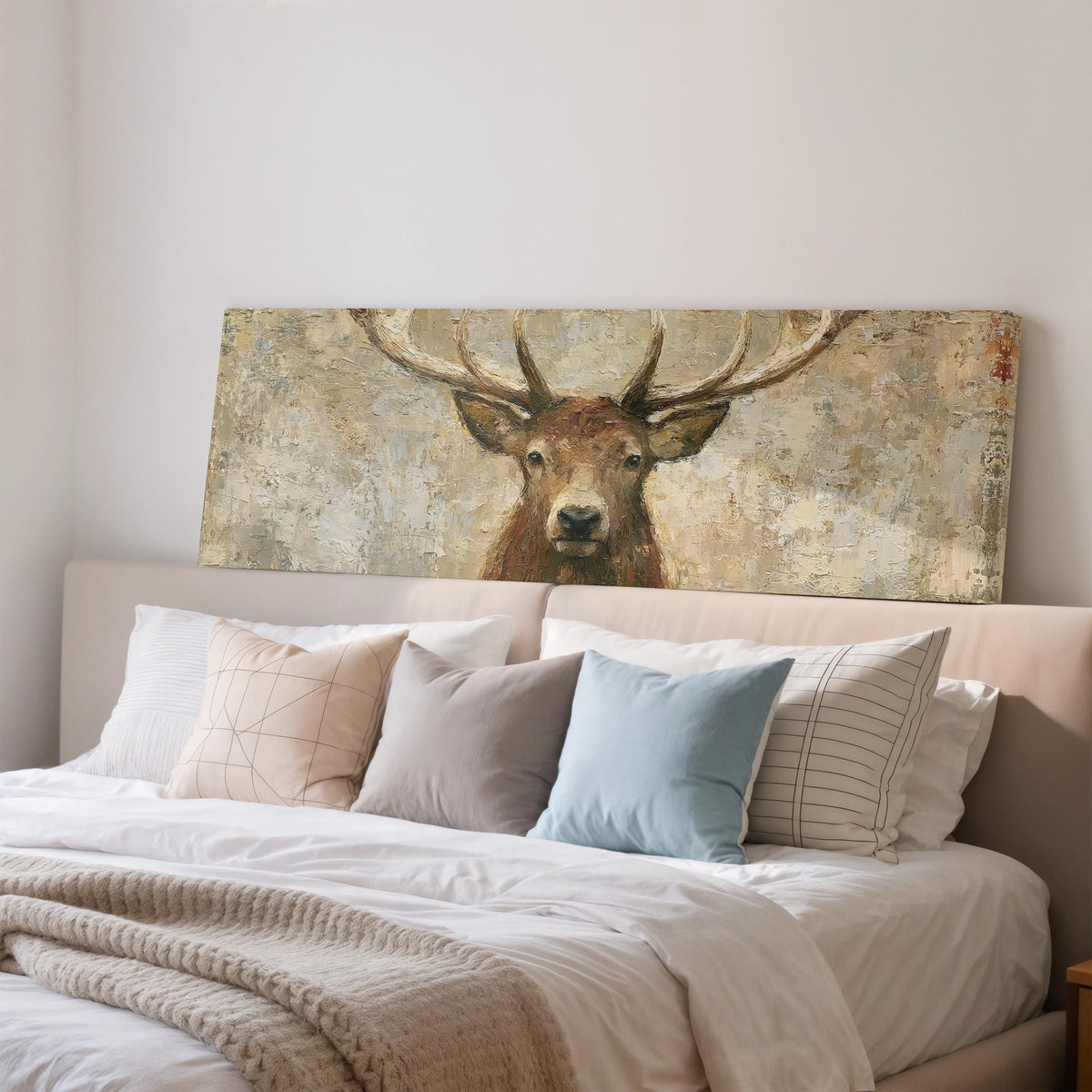 Rustic stag portrait wide panoramic canvas print above a bed in a bedroom