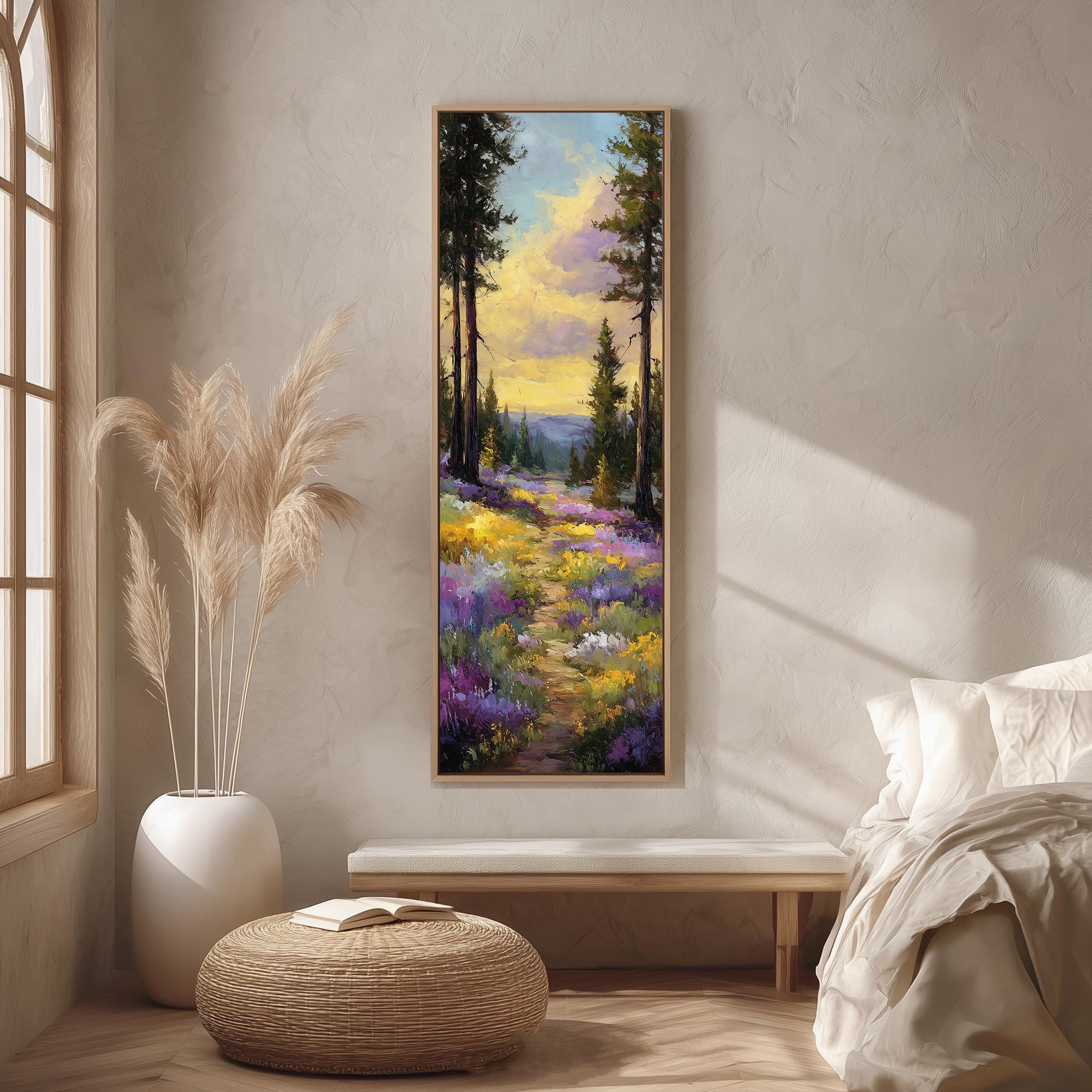 a serene bedroom scene with a large painting of a colorful garden hanging on the wall. The painting depicts a winding path surrounded by a variety of flowers and trees, creating a peaceful and picturesque landscape. The room is decorated with a large window, a white bed, and a wicker ottoman, contributing to the overall calm and inviting atmosphere.