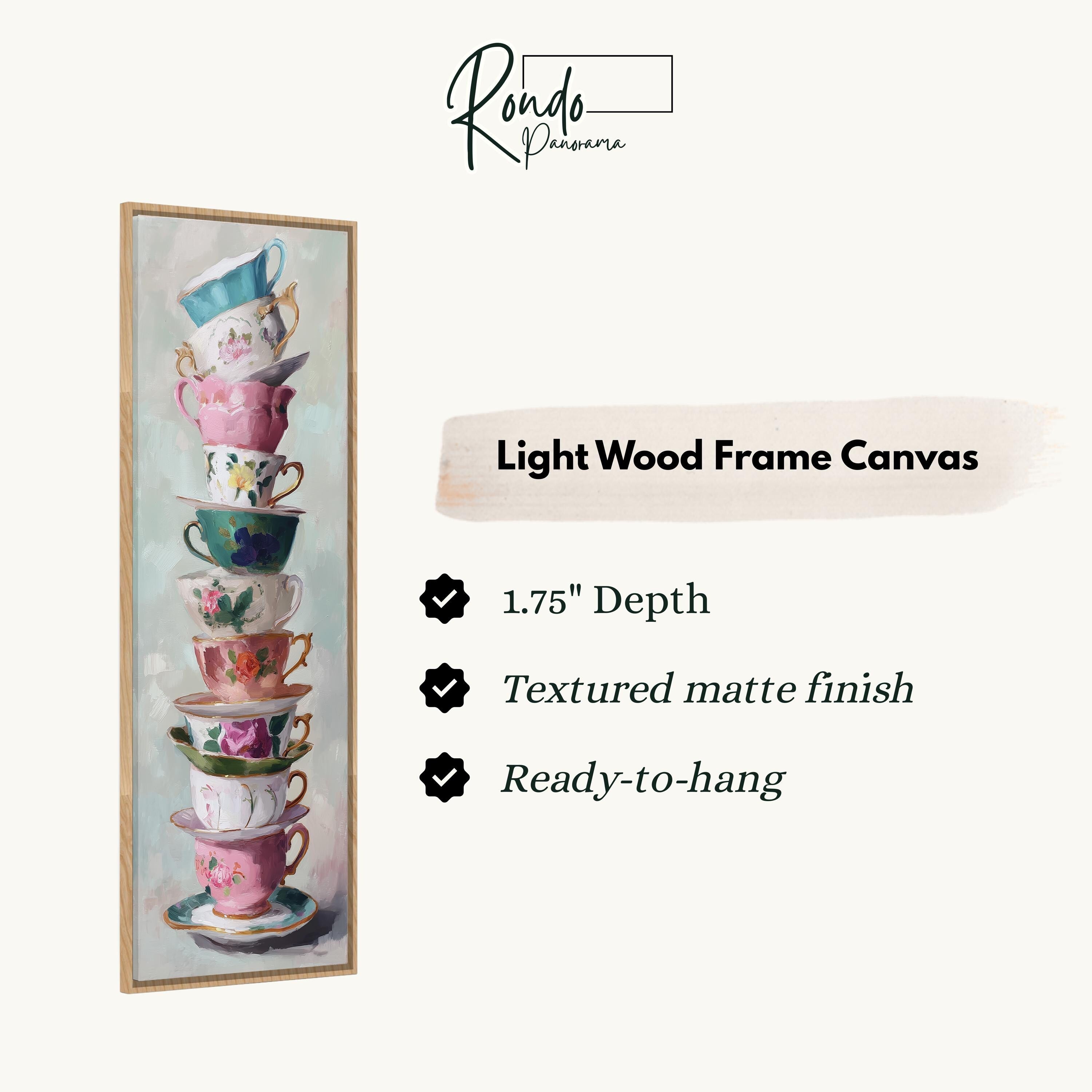 a tall stack of colorful teacups, with a light wood frame canvas hanging next to it.