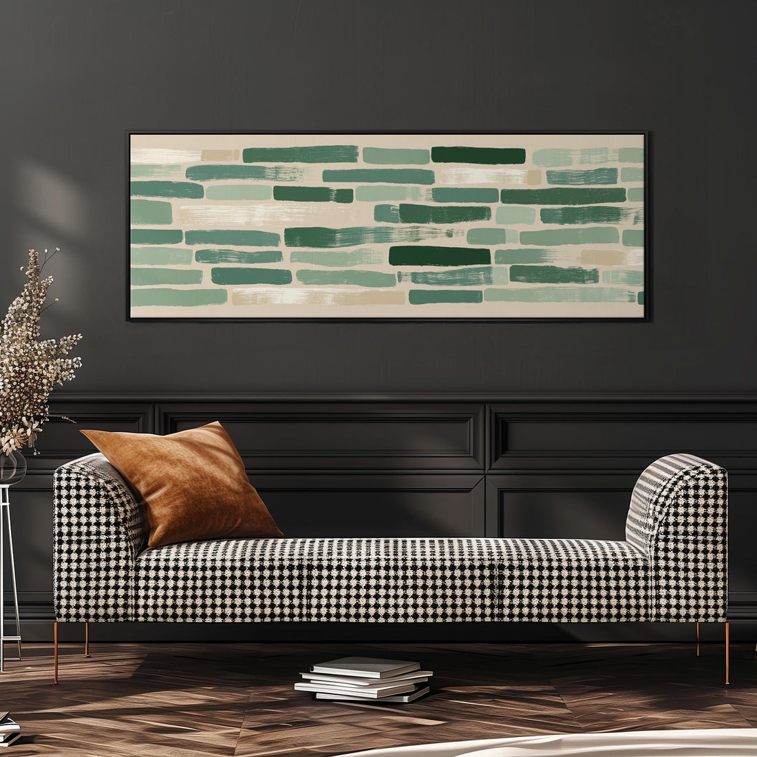 a large, rectangular painting hanging on a wall above a brown sofa with orange cushions.