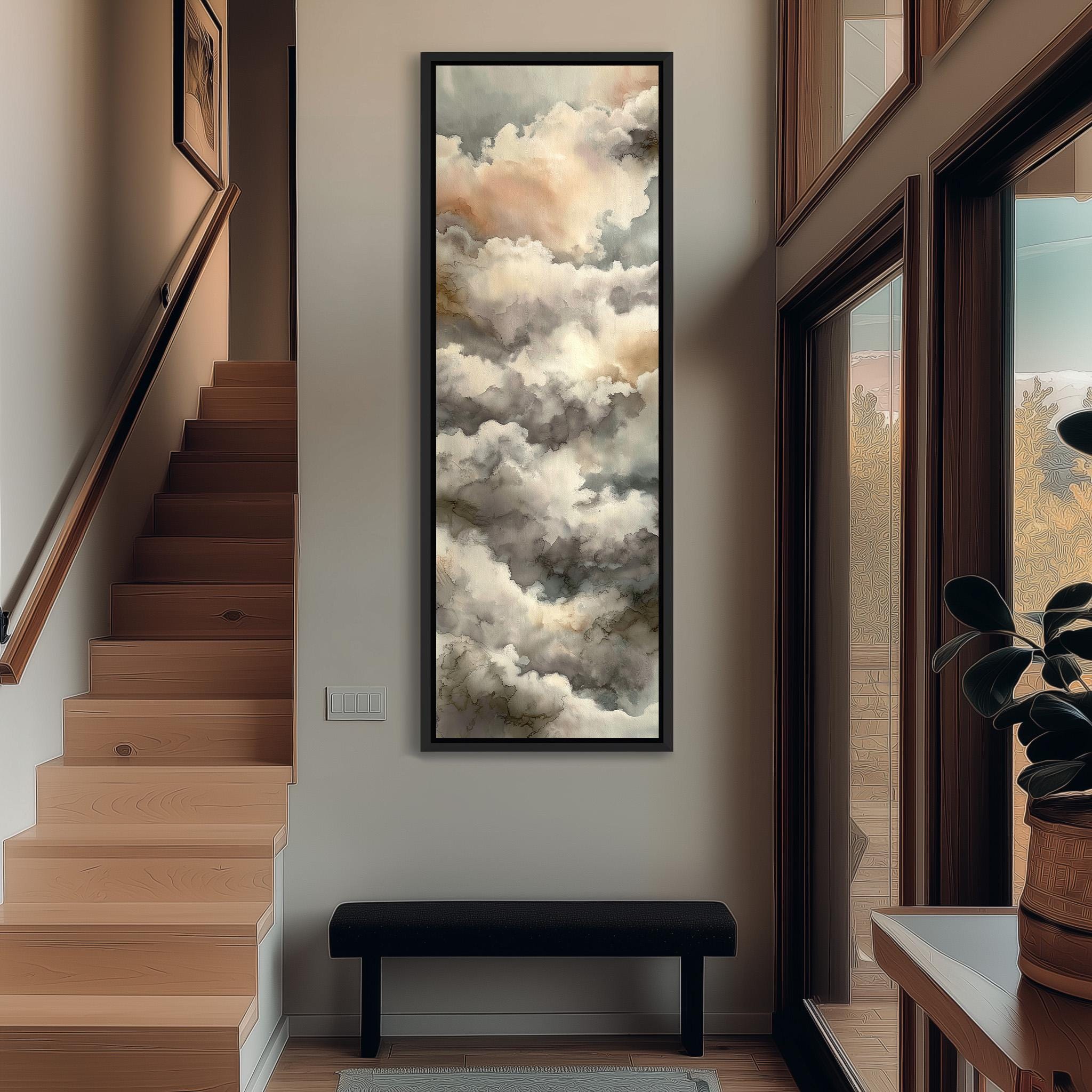 a hallway with a large painting of clouds hanging on the wall, a wooden staircase, a black bench, and a plant in a pot.
