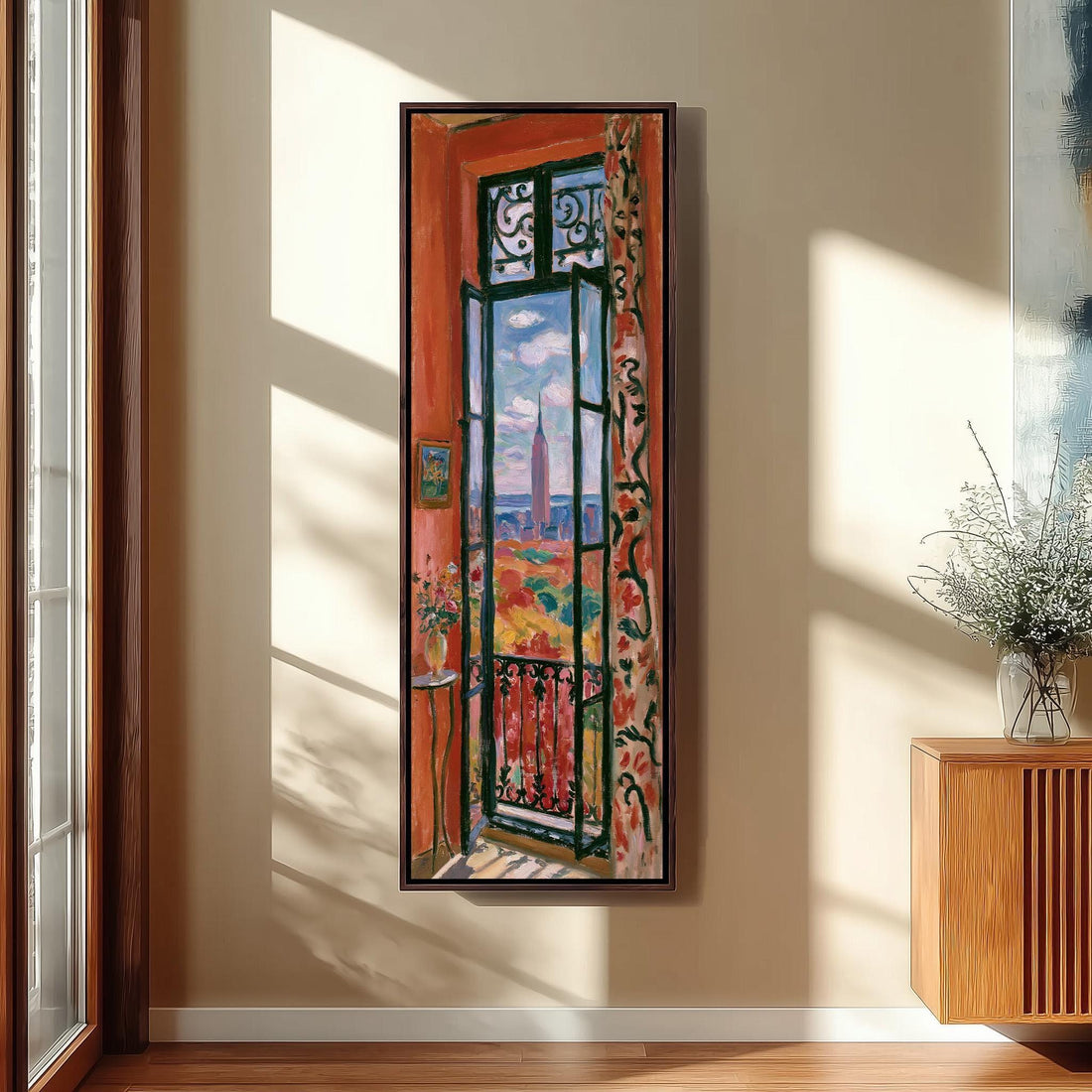 Empire State Building through a tall window long vertical canvas print in a sunlit living space