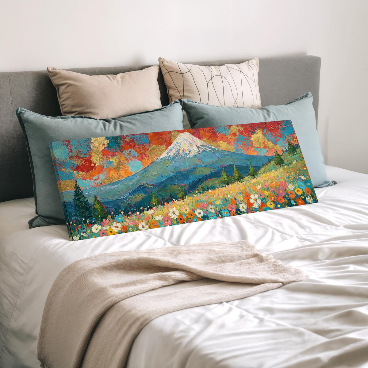 Mount Fuji under a red and gold sunset sky wide panoramic canvas print laid on a bed to show its size