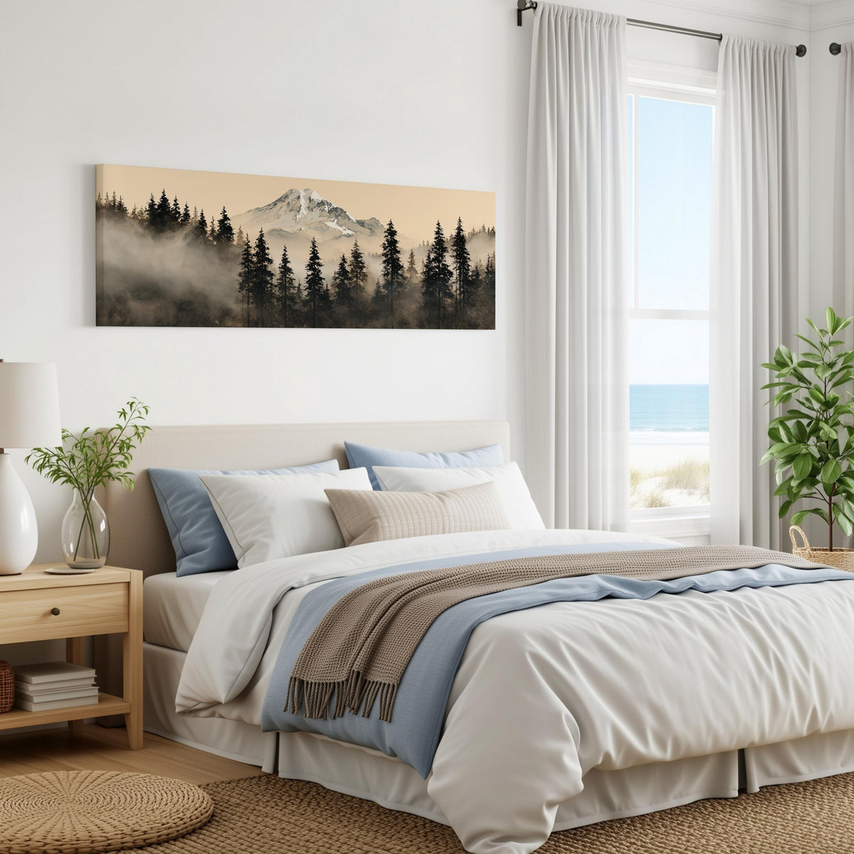 Foggy pine forest below a snowy mountain panoramic canvas print above a bed in a coastal bedroom