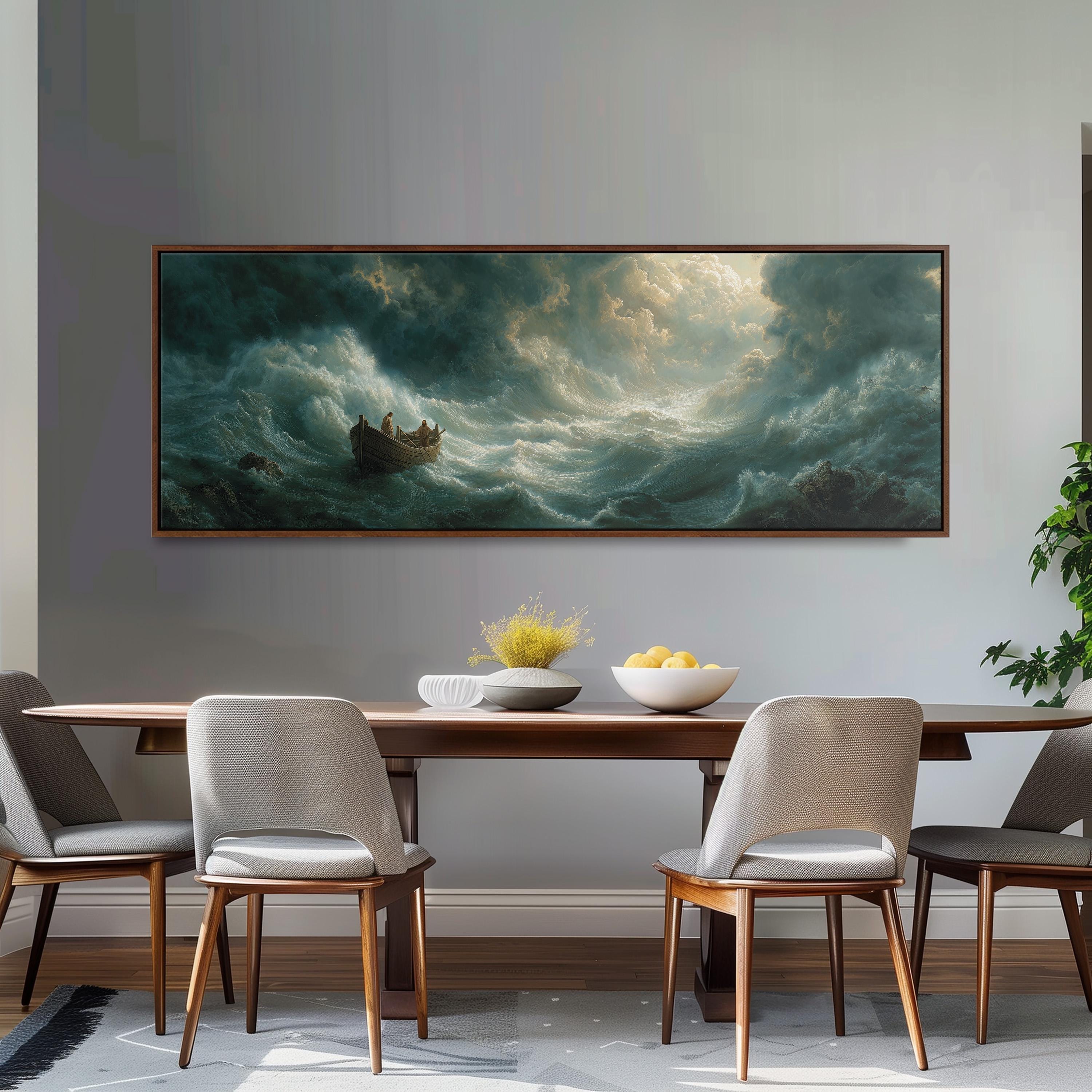 a large painting of a stormy sea hanging on a wall above a wooden dining table with four chairs. The painting depicts a boat sailing through rough waters, with a large wave crashing behind it. The table is set with a bowl of fruit and a vase of flowers, creating a cozy and inviting atmosphere.