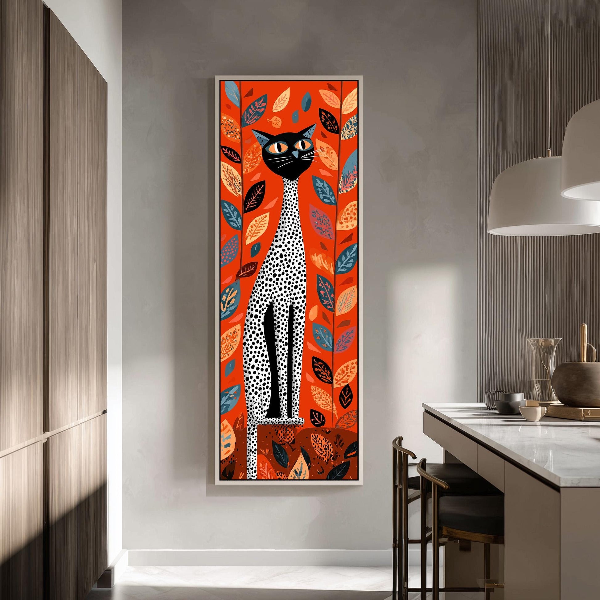a large, colorful painting of a cat with a predominantly orange and black color scheme, surrounded by various leaves and foliage. The painting is hanging on a wall in a room with a kitchen counter and chairs visible in the background.