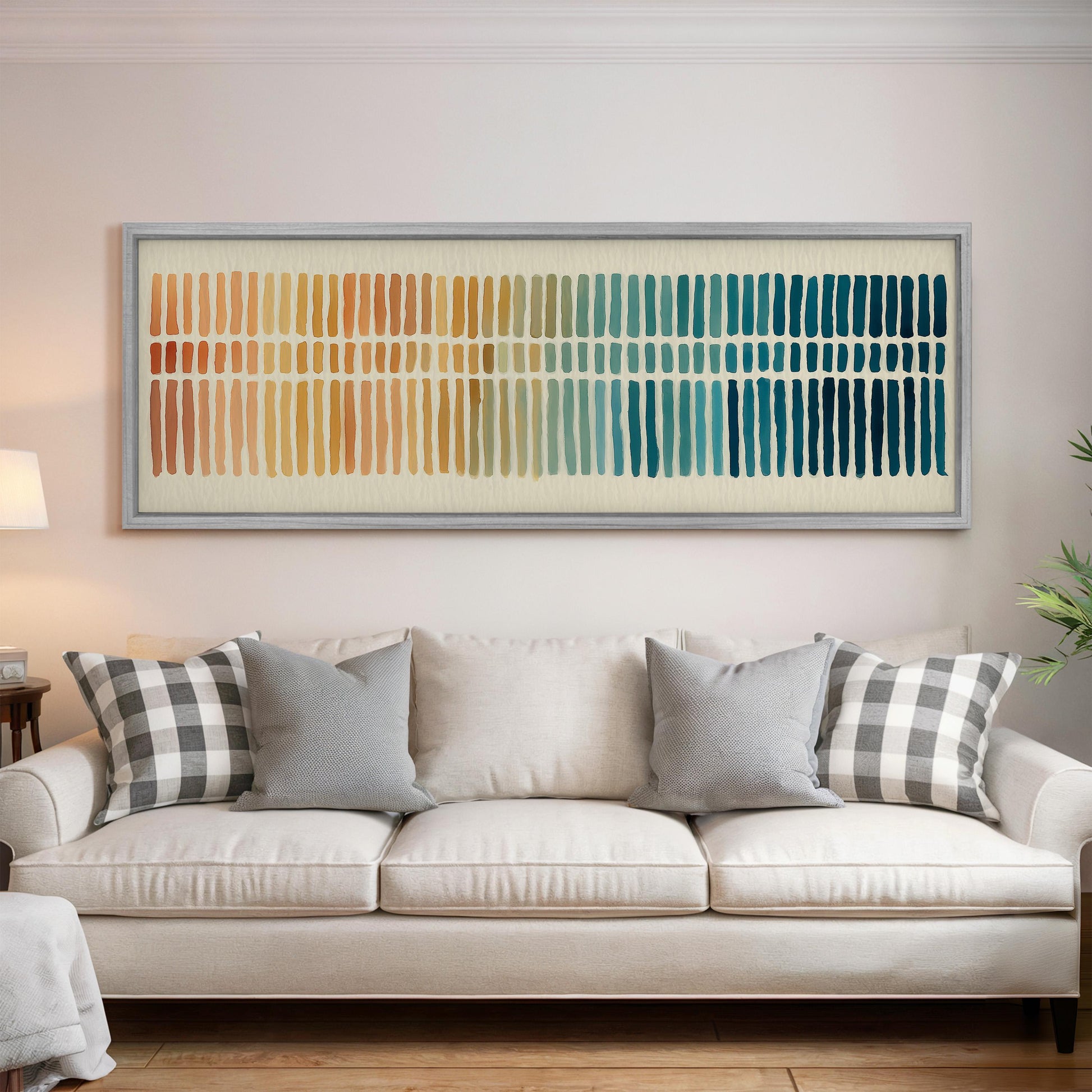 a living room with a white sofa and a large abstract painting hanging on the wall above it.