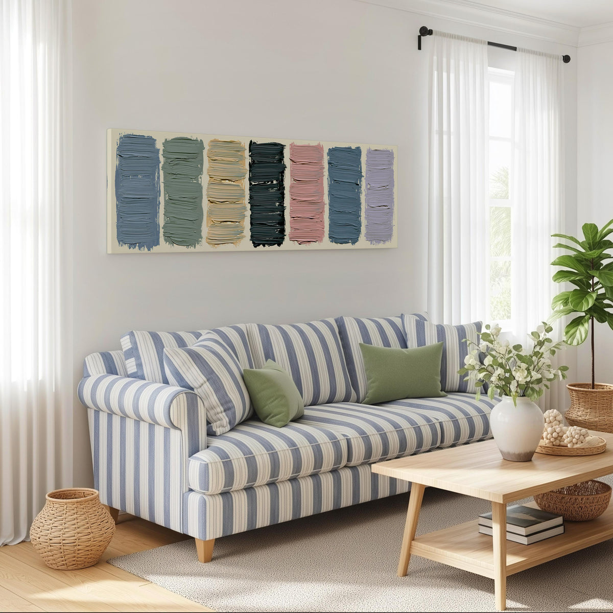 Pastel brushstroke color swatches long horizontal canvas print above a striped sofa in a coastal living room