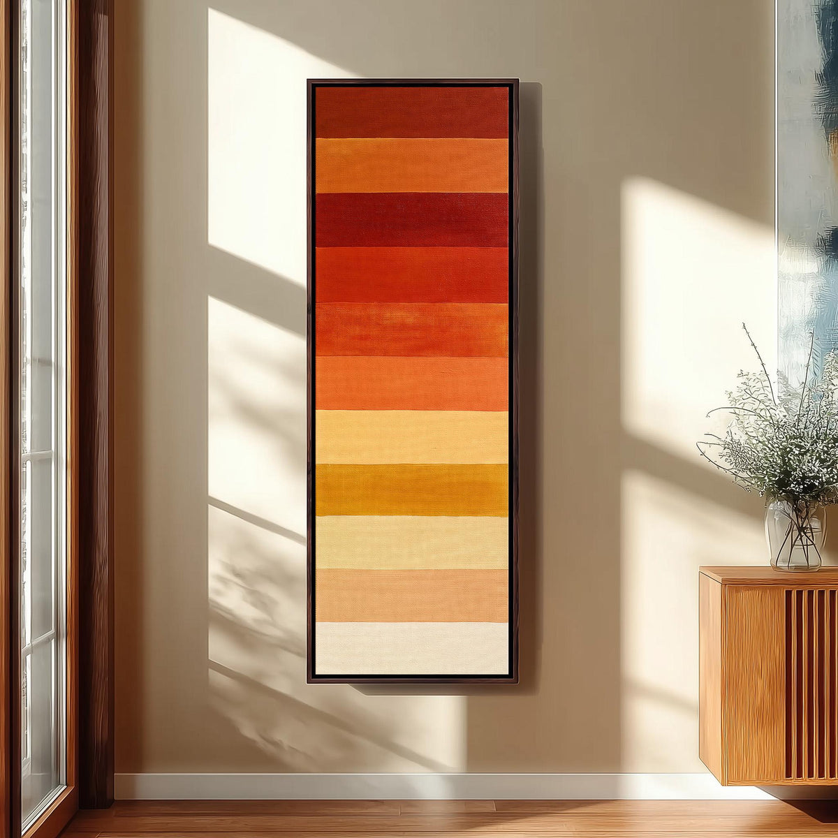 Horizontal stripes from rust to mustard and cream long vertical canvas print in a sunlit living space