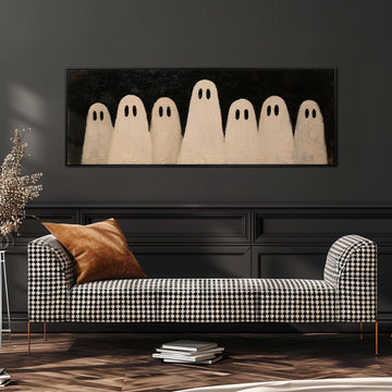 Friendly ghost gang long horizontal canvas print above a sofa in a living room