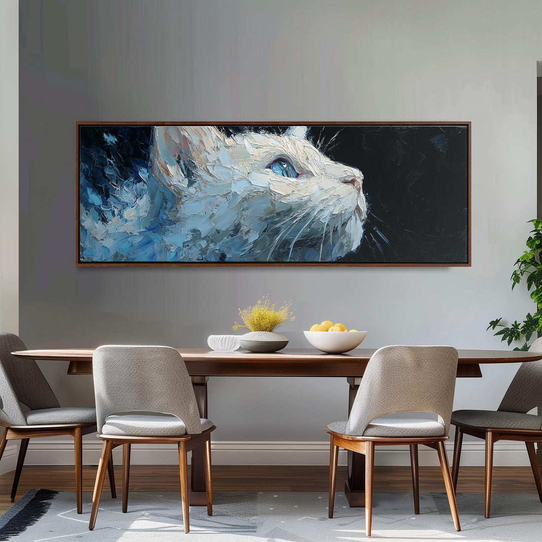 a large, colorful painting of a cat's face hanging on a wall above a black and white checkered sofa in a modern living room setting.