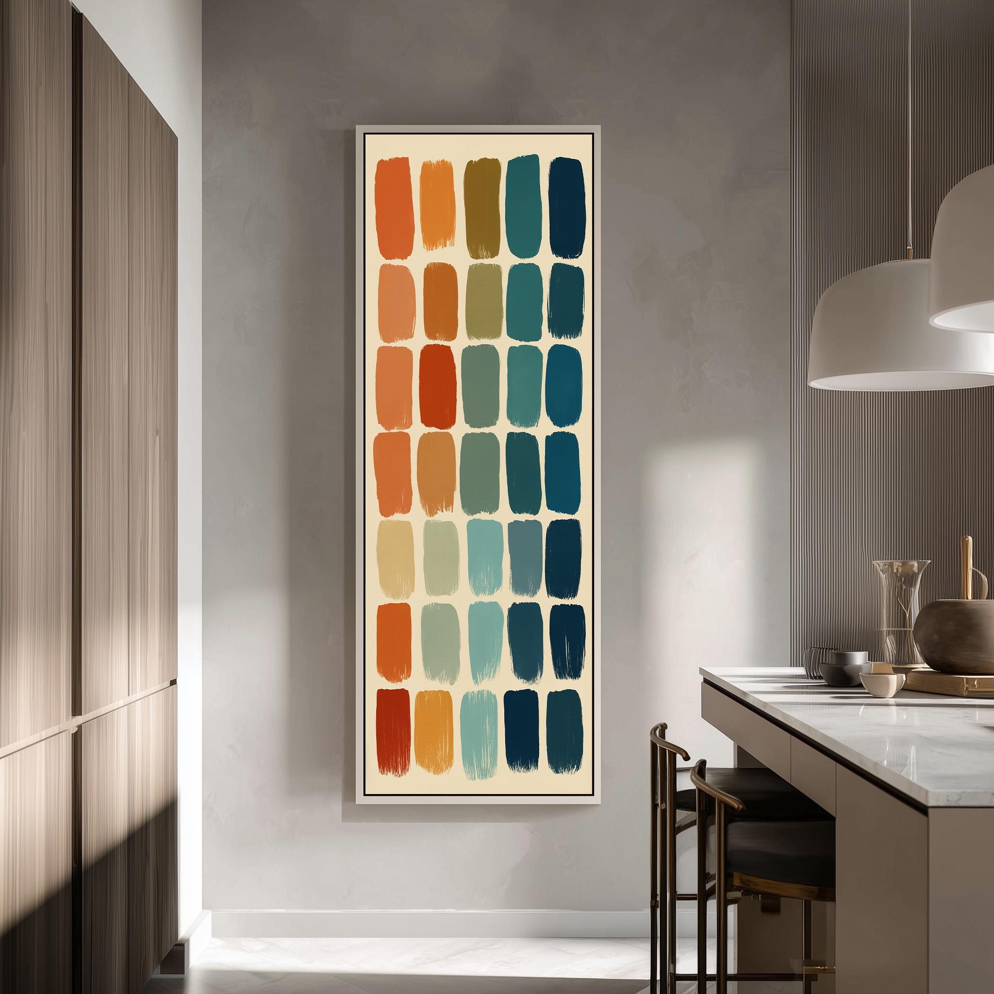a modern kitchen with a large abstract painting hanging on the wall. The painting consists of a grid of various colored squares, creating a vibrant and dynamic visual display.