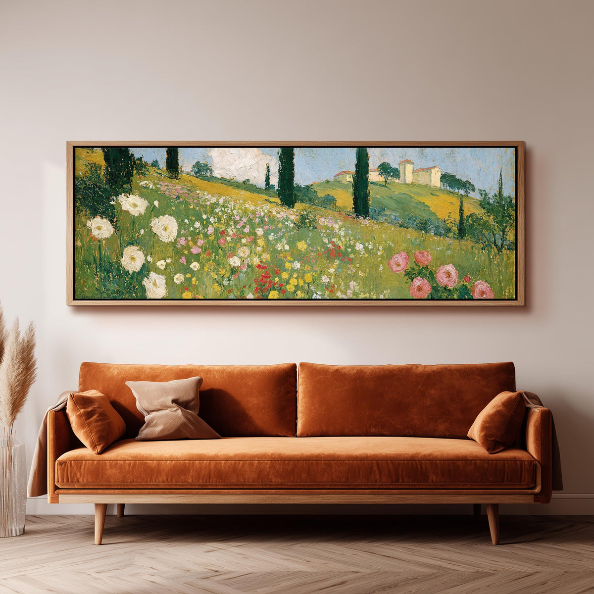 Tuscan wildflower hillside with cypress trees long horizontal canvas print above a sofa in a living room
