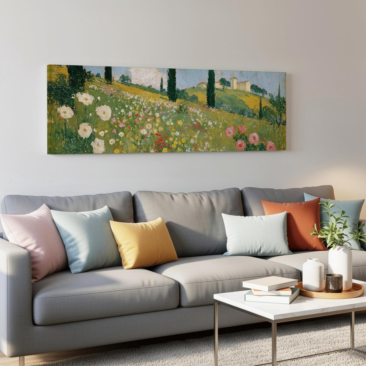 Tuscan wildflower hillside with cypress trees panoramic canvas print above a grey sofa in a living room
