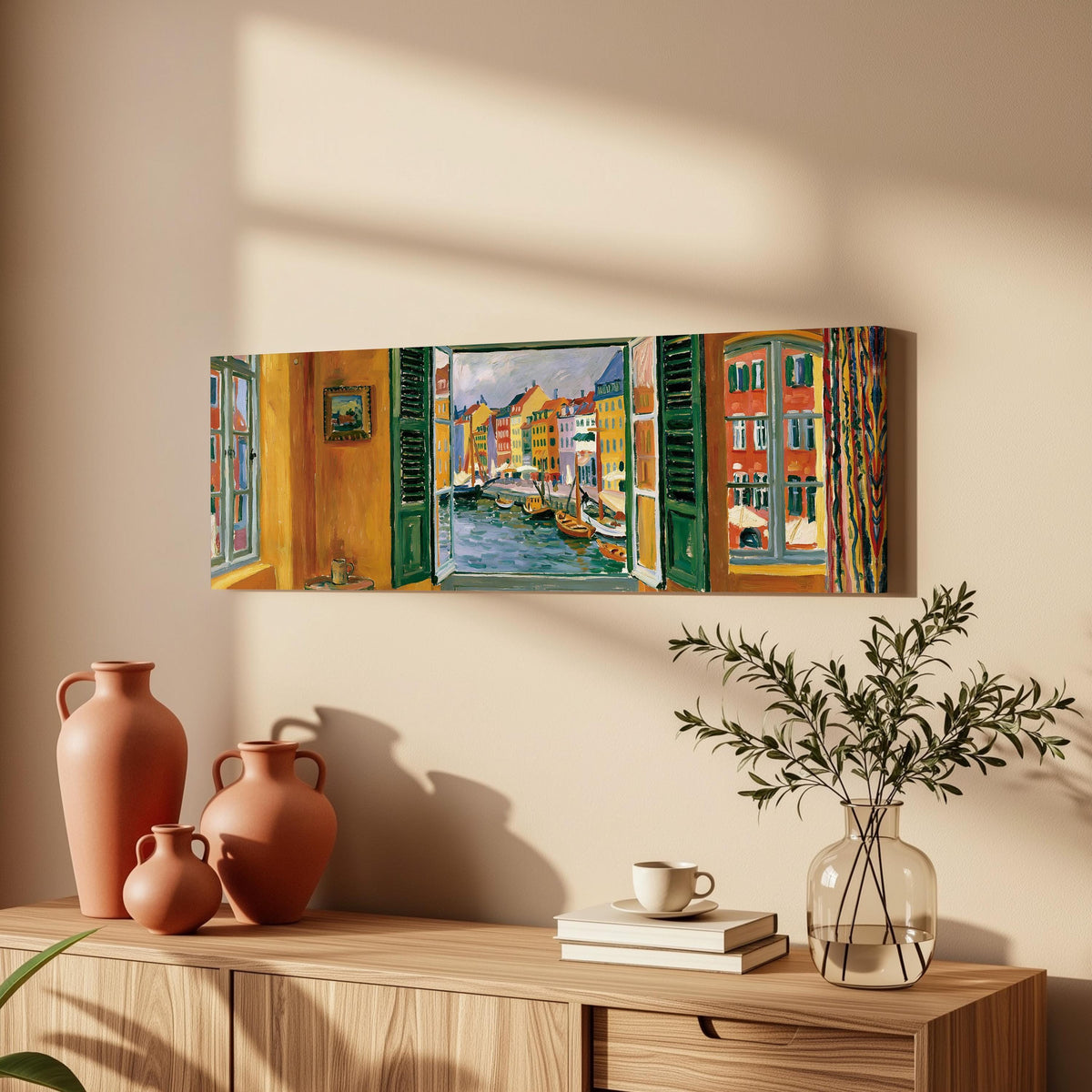 Copenhagen's colorful canal through a window long horizontal canvas print above a wooden sideboard