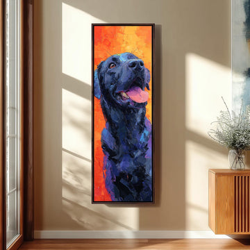 a large, colorful painting of a black dog with a pink tongue, hanging on a wall in a room with a wooden cabinet and a vase of flowers.