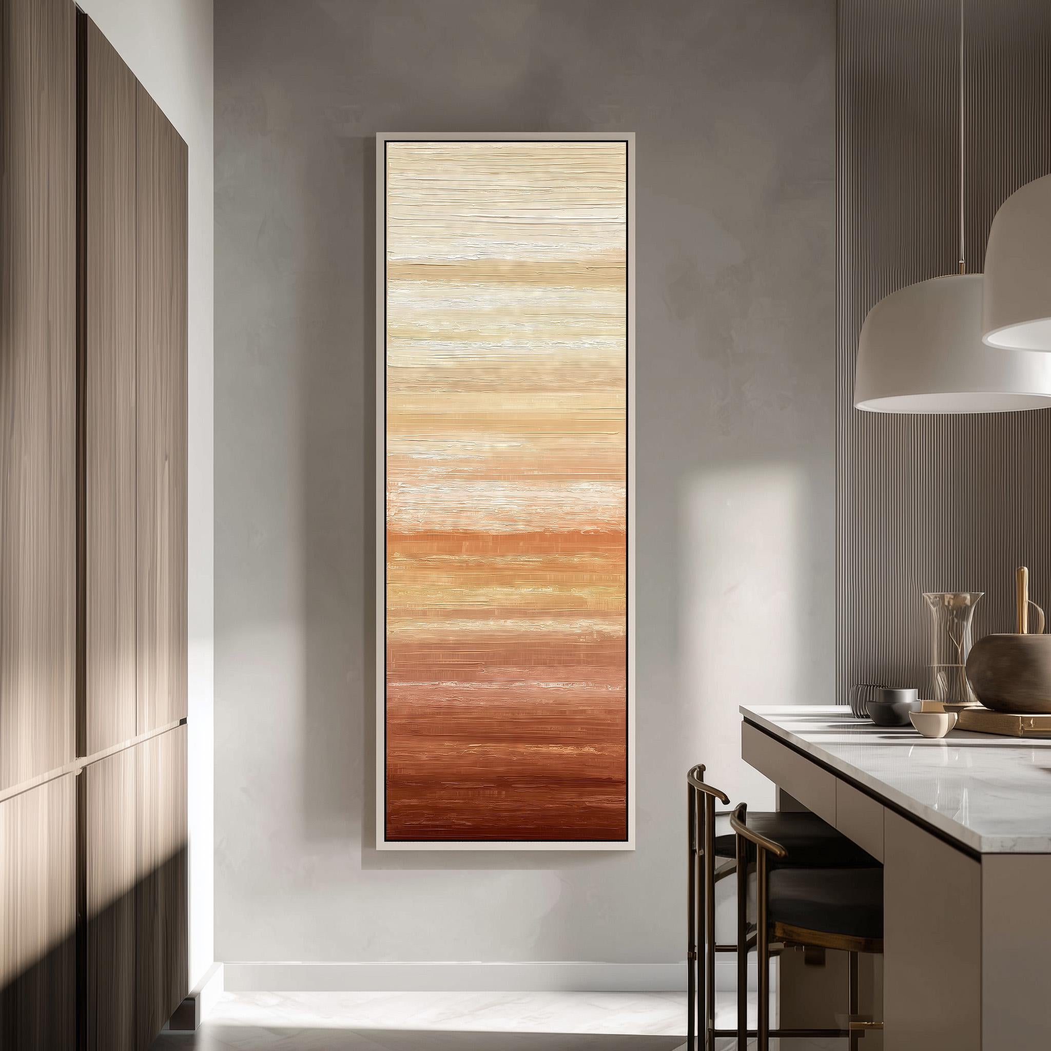 a modern kitchen with a large, abstract painting hanging on the wall. The painting has a gradient of colors, transitioning from warm orange to cooler yellow, creating a visually striking contrast against the neutral-toned walls. The kitchen is equipped with a white countertop and a barstool, and there is a pendant light hanging above the counter, providing illumination to the space.