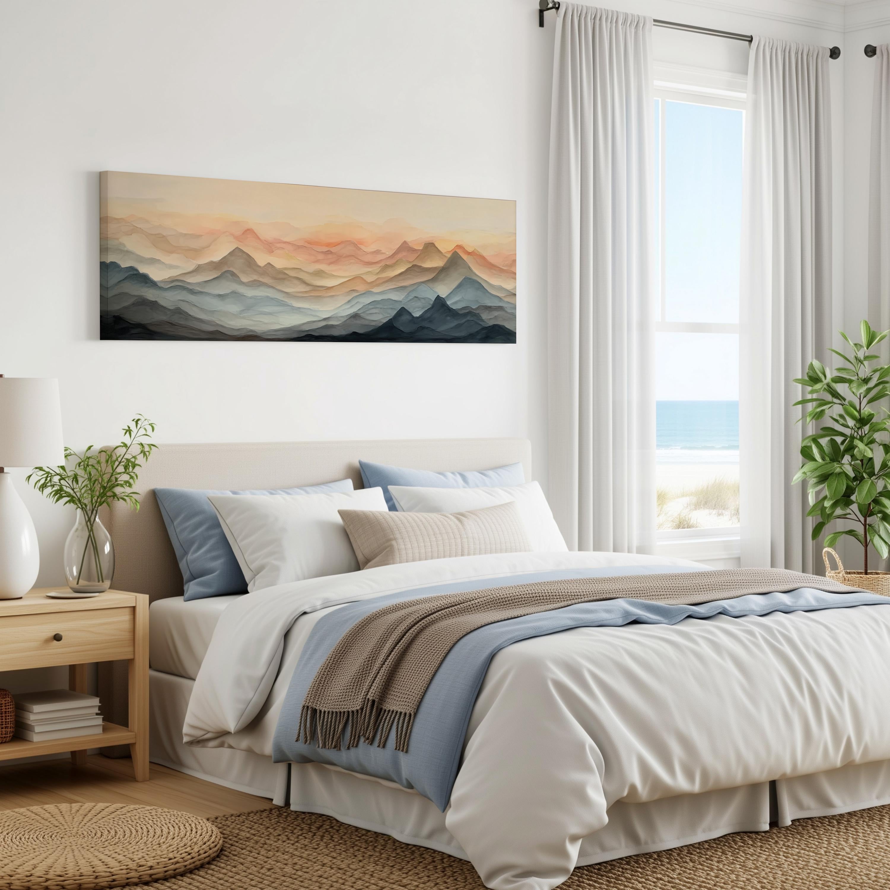 a serene bedroom with a large bed, a nightstand, and a painting of mountains on the wall. The room has a calming color palette, with white walls, a beige bedspread, and a blue throw blanket. The painting adds a natural element to the space, and the window provides a view of the ocean.