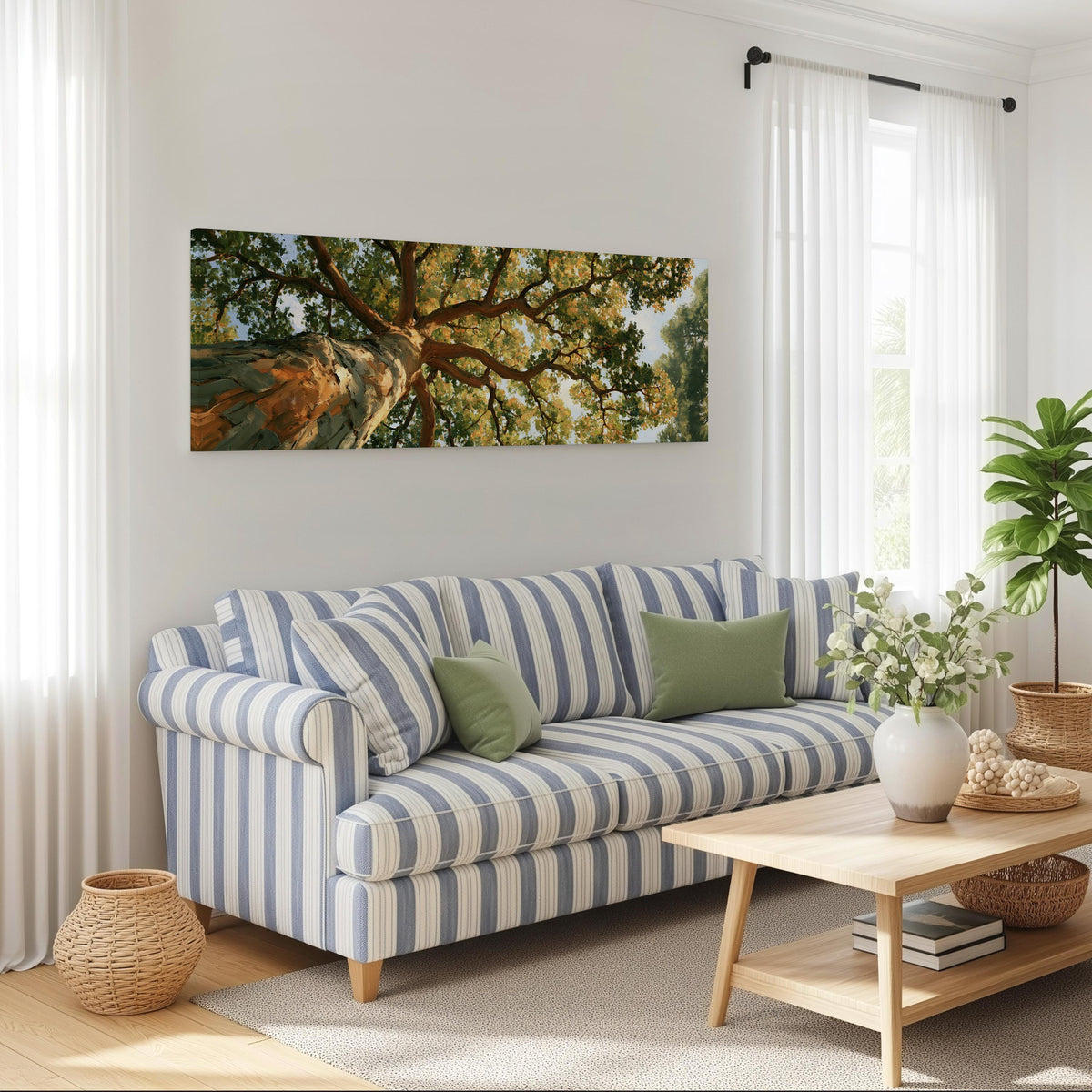 Autumn oak canopy seen from below long horizontal canvas print above a striped sofa in a coastal living room