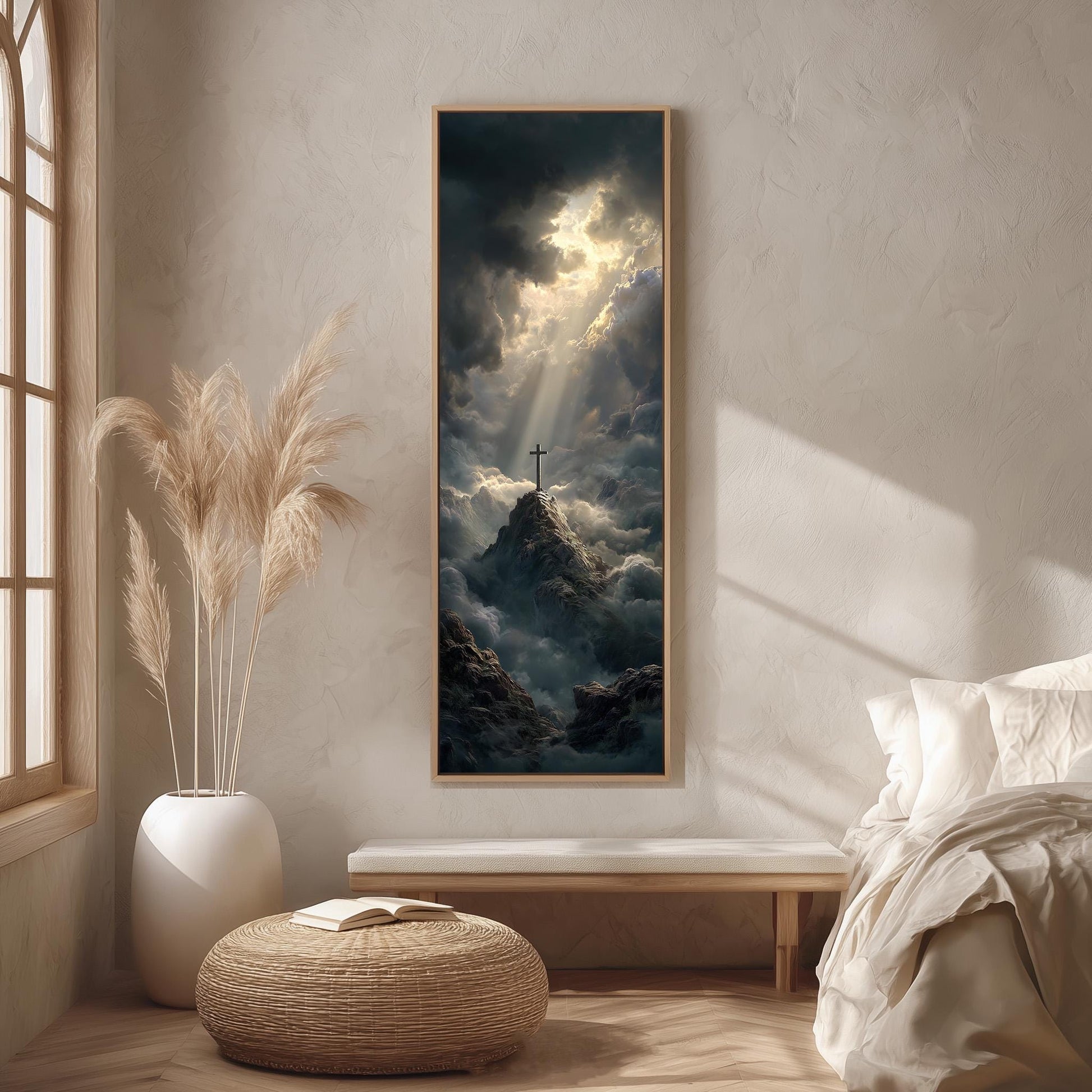 a serene bedroom scene with a large framed painting of a mountain landscape hanging on the wall, featuring a cross on top of a mountain. The painting is surrounded by natural elements, such as a potted plant and a woven ottoman, creating a peaceful and tranquil atmosphere.