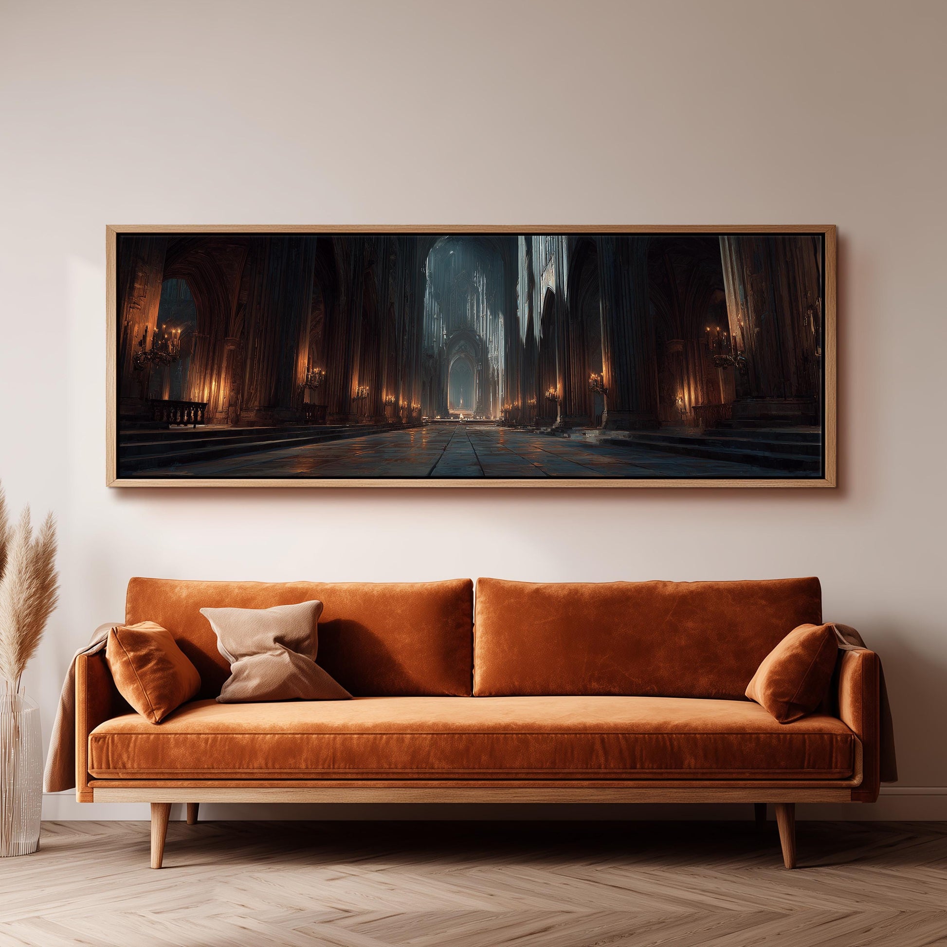 a large, ornate, and grand interior scene with a long hallway, arches, and a chandelier, all illuminated by candles. The scene is captured in a painting or framed artwork, which is hanging on the wall above a brown sofa.