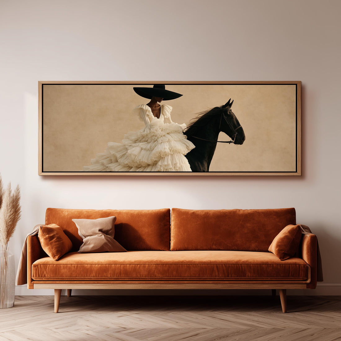 Woman in a ruffled gown on a black horse long horizontal canvas print above a sofa in a living room