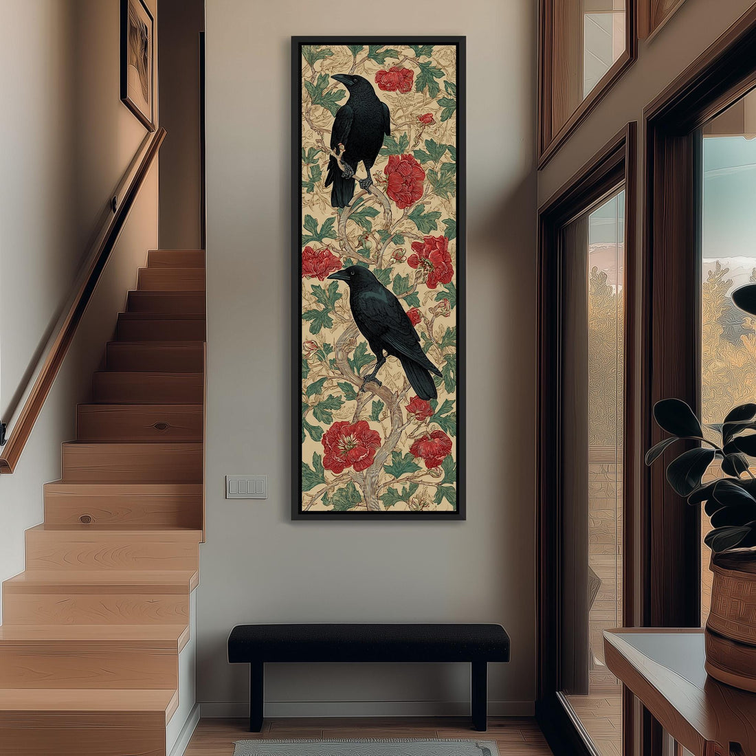 a hallway with a wooden staircase, a black bench, and a framed artwork of two black birds perched on a floral background.