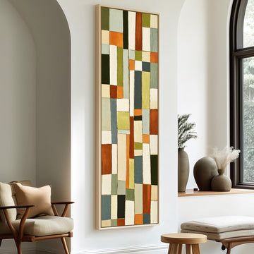 Muted sage, terracotta and cream block grid long vertical canvas print in a sunlit living space