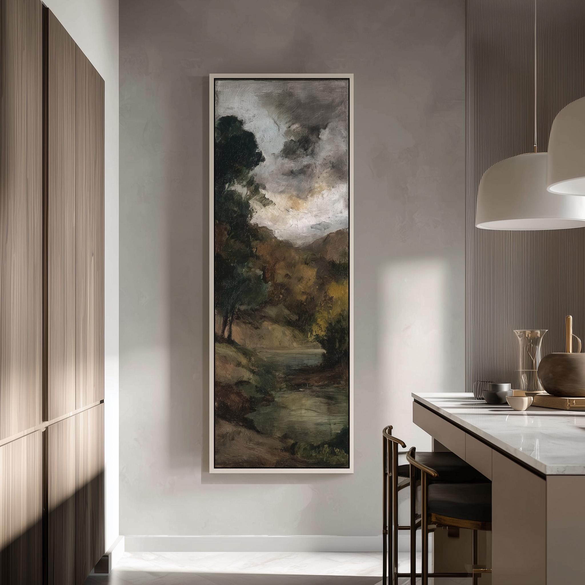 a large painting of a landscape hanging on a wall in a modern kitchen.