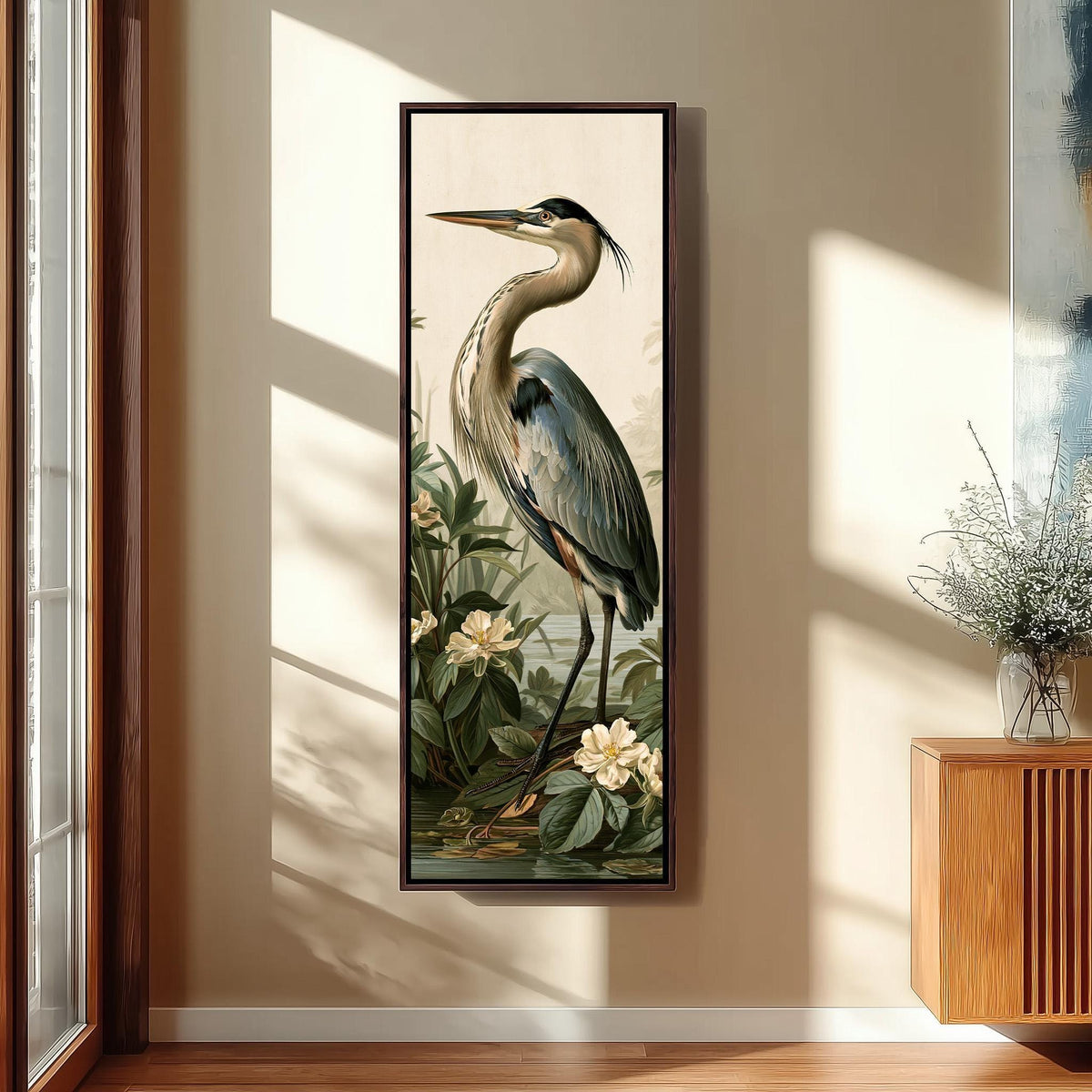 Blue heron among magnolia blooms tall skinny canvas print in a sunlit living space